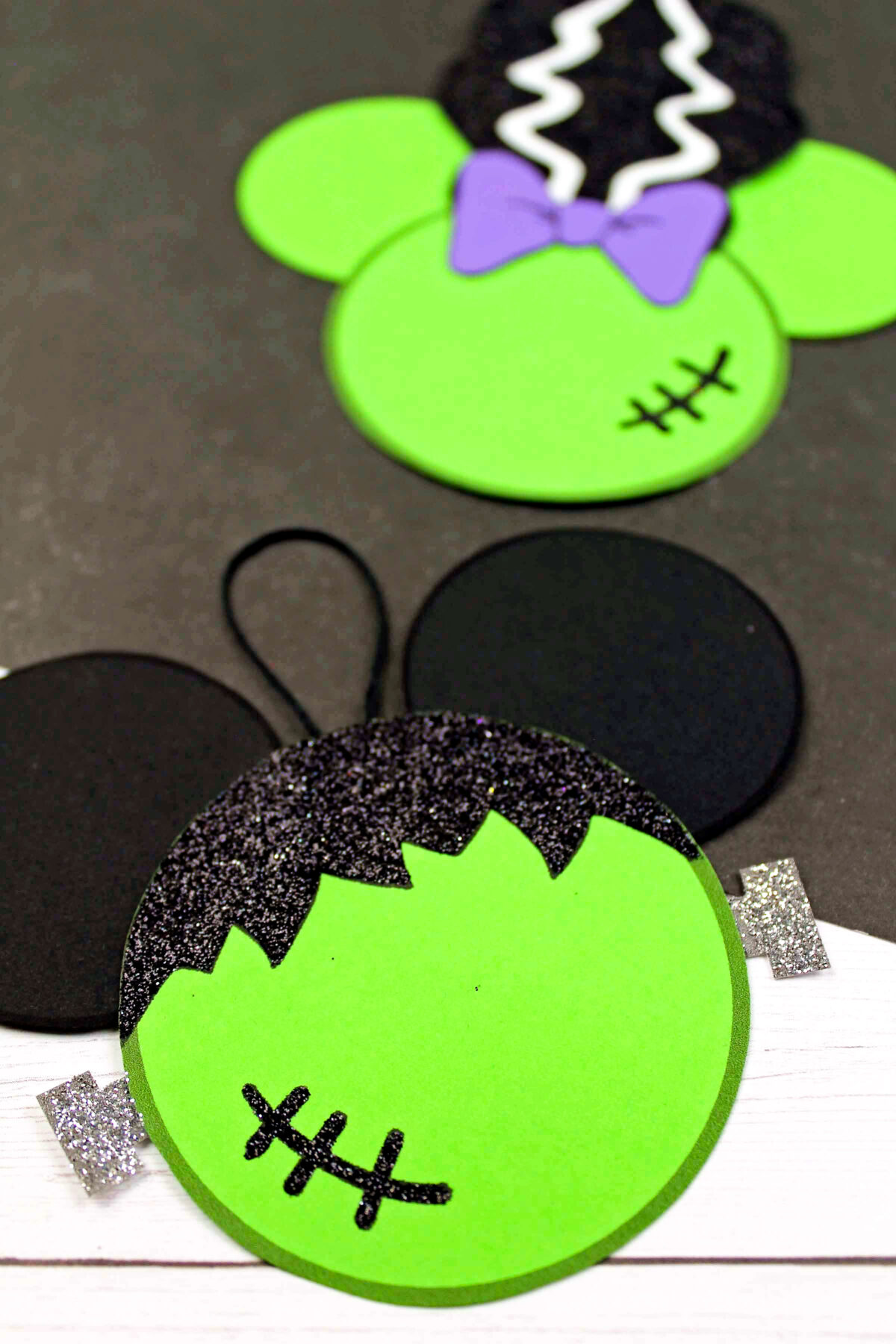 Make this easy DIY Frankenstein Mickey ears ornament for your Christmas tree. Easy, fun, and festive craft for anyone into spooky things!