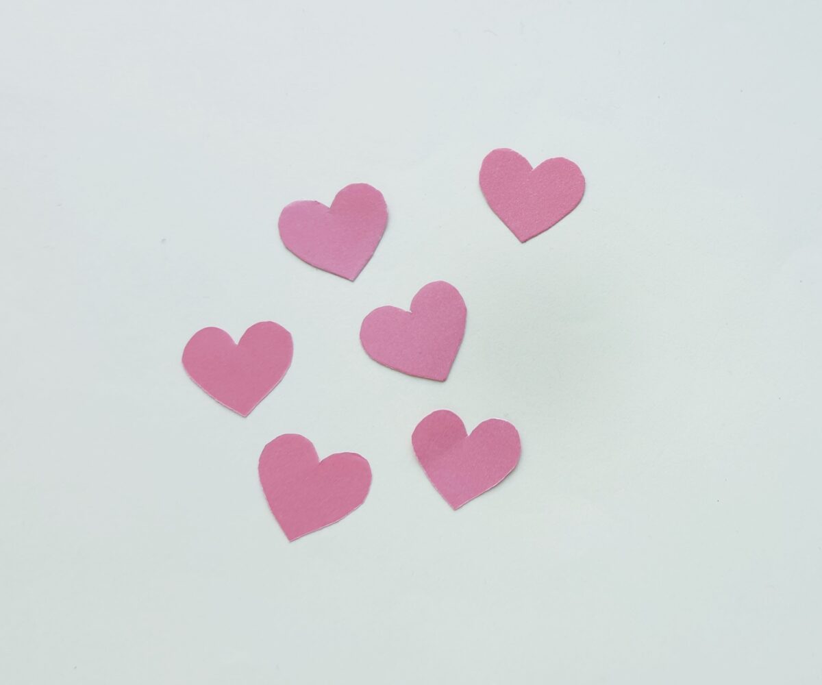 Trace and cut out the heart shapes from the selected coloured craft paper.