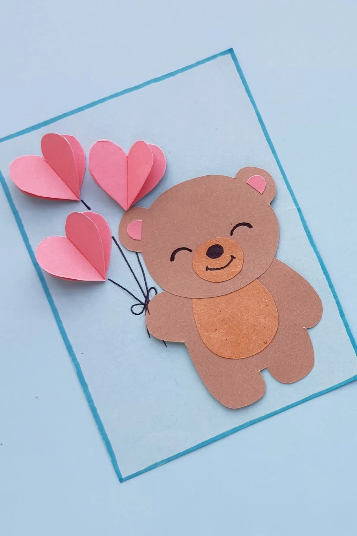 Kids can make a Teddy Bear Valentine's Day Card to give to their friends using construction paper. This craft is an easy activity for kids.