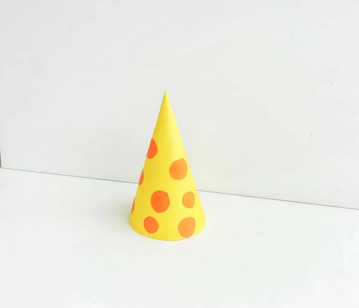 Orange spots on the yellow cone.