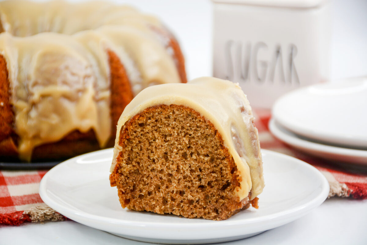 This easy salted caramel cake recipe is perfect for any occasion! A moist and fluffy caramel bundt cake that is smothered in a caramel glaze.