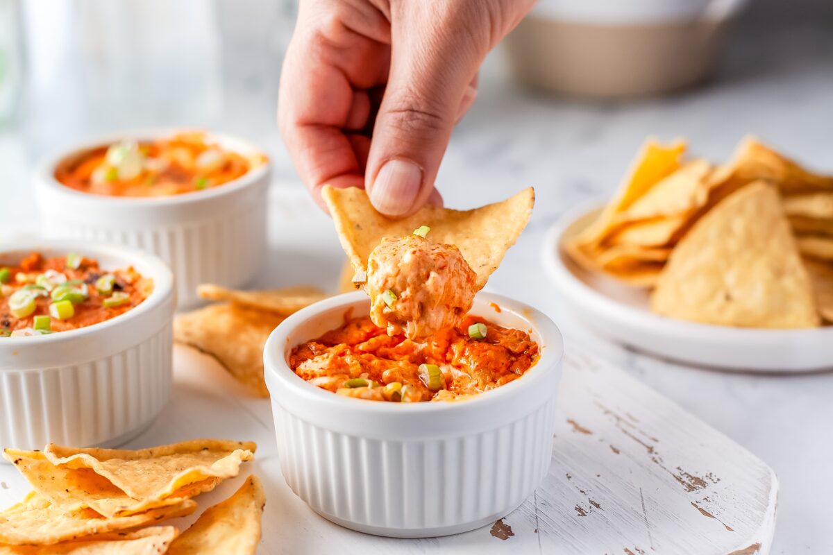 This easy buffalo chicken dip recipe is a perfect appetizer for game day! Loaded with chicken, cheese, and hot sauce, it's always a big hit.