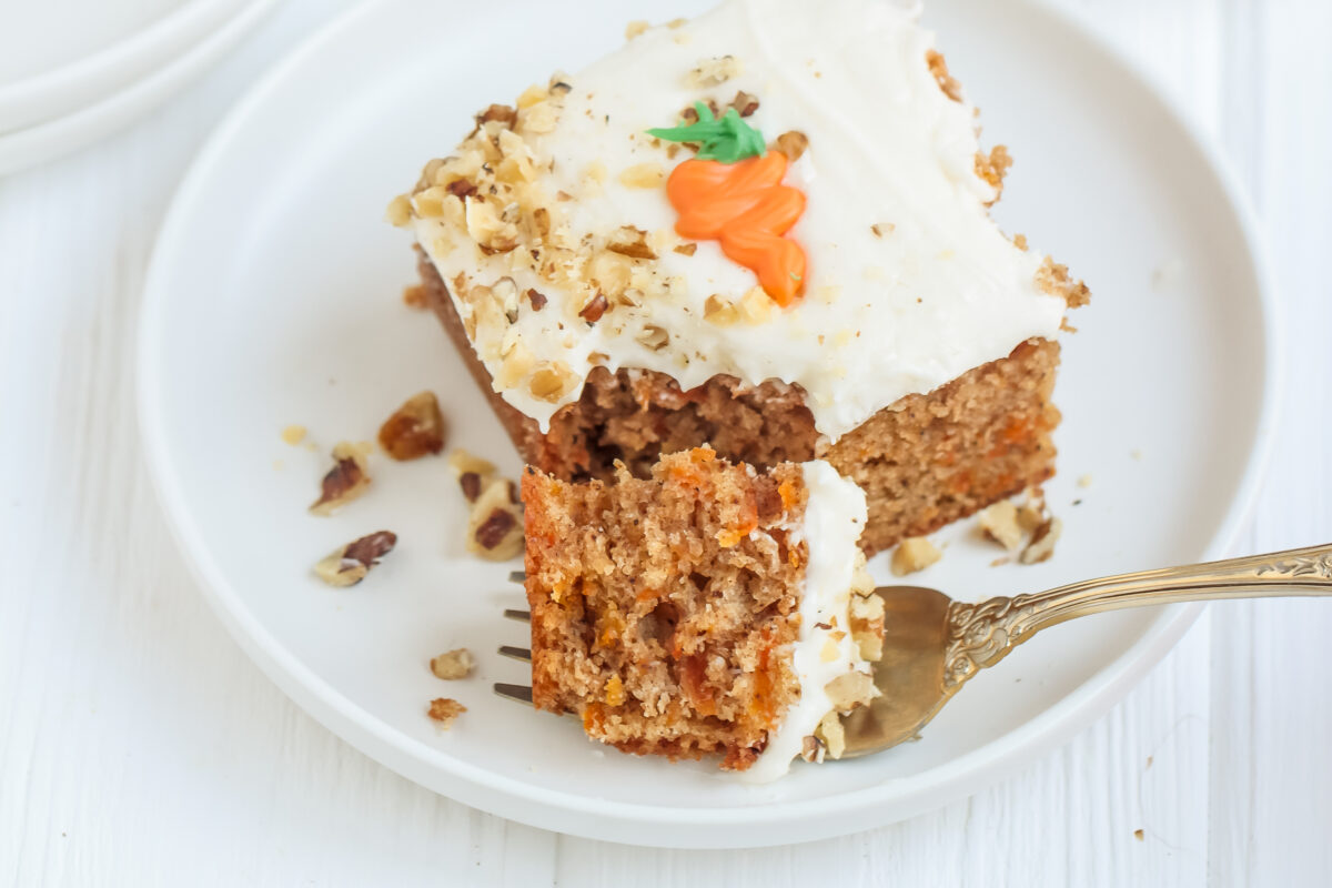 This carrot sheet cake recipe is easy to make, and looks great on a plate. It's moist, perfectly spiced, and not to mention, it's delicious!