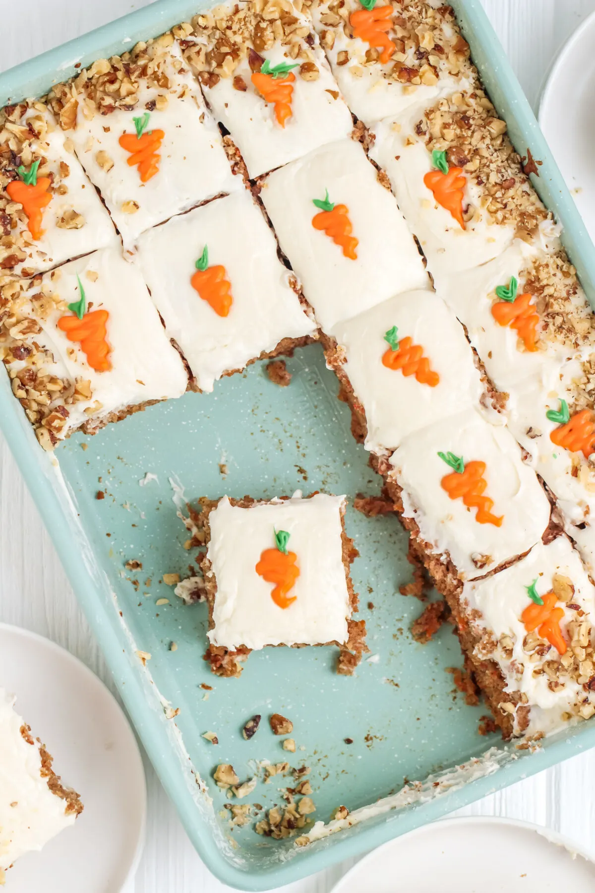 This carrot sheet cake recipe is easy to make, and looks great on a plate. It's moist, perfectly spiced, and not to mention, it's delicious!