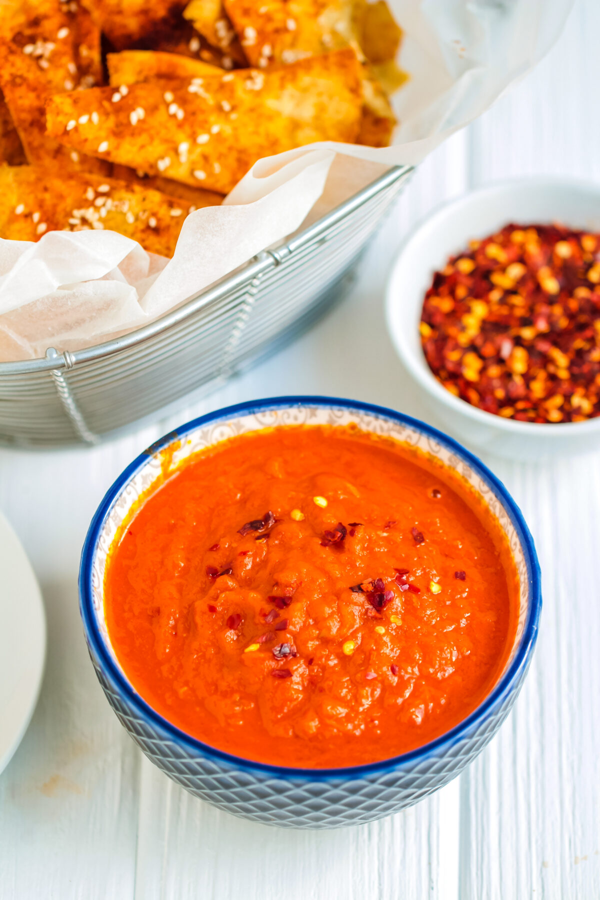 Smoky Spanish tomato dip, or salsa brava, is the perfect appetizer for your next party! Bravas sauce is full of flavour and easy to make!