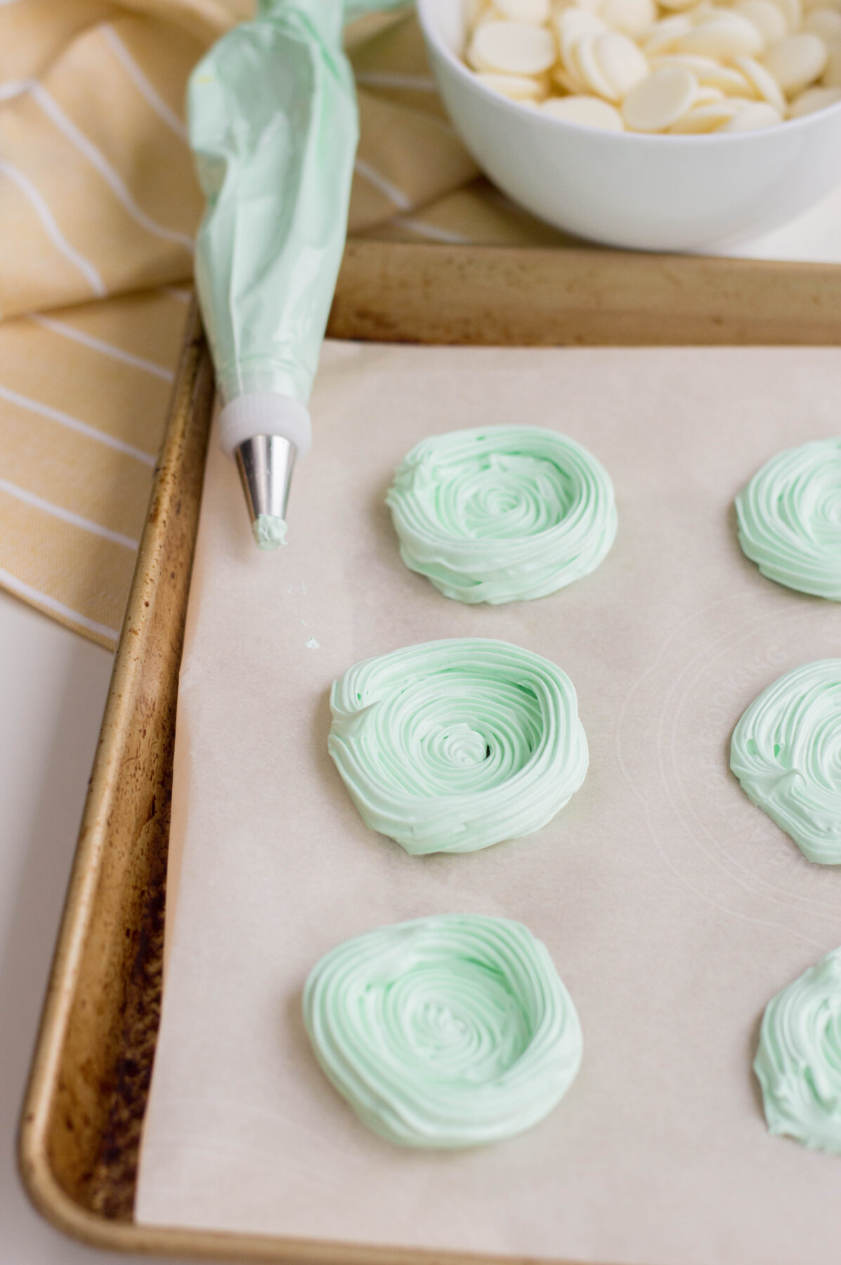 "nests" made with a circle of meringue piped around the outer edge of the meringue circles,