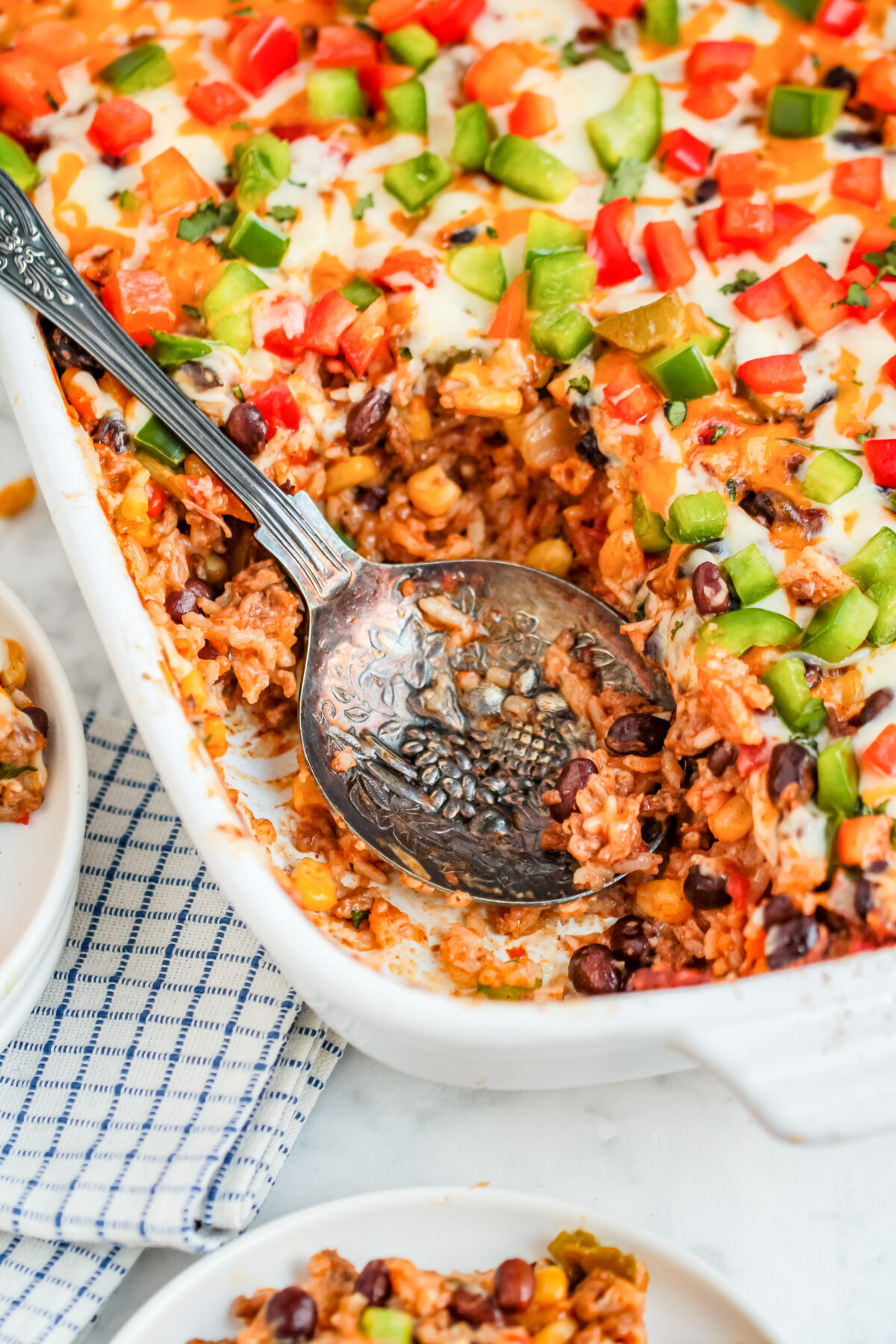 This easy Mexican ground beef casserole recipe is perfect for a weeknight meal! It's a hearty, comforting, and delicious casserole.