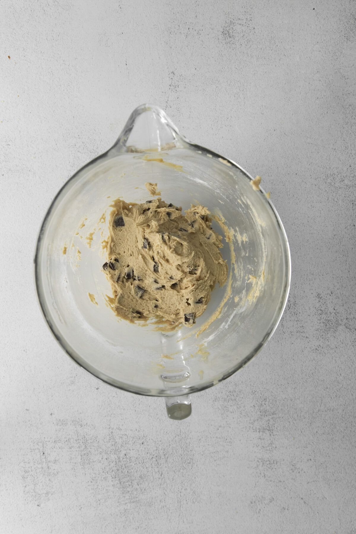 Dough prepared in a large mixing bowl.