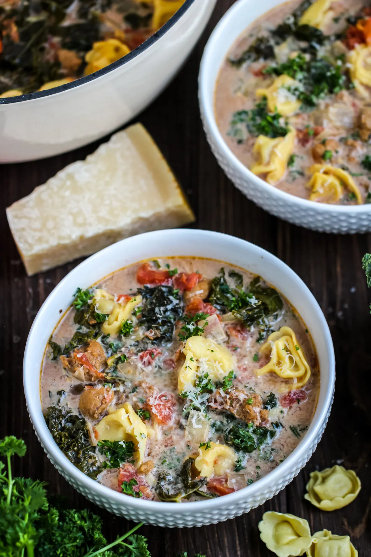 This easy Tortellini Soup with Italian Sausage and Kale recipe is the perfect weeknight meal! It is a hearty soup that is packed with flavour.