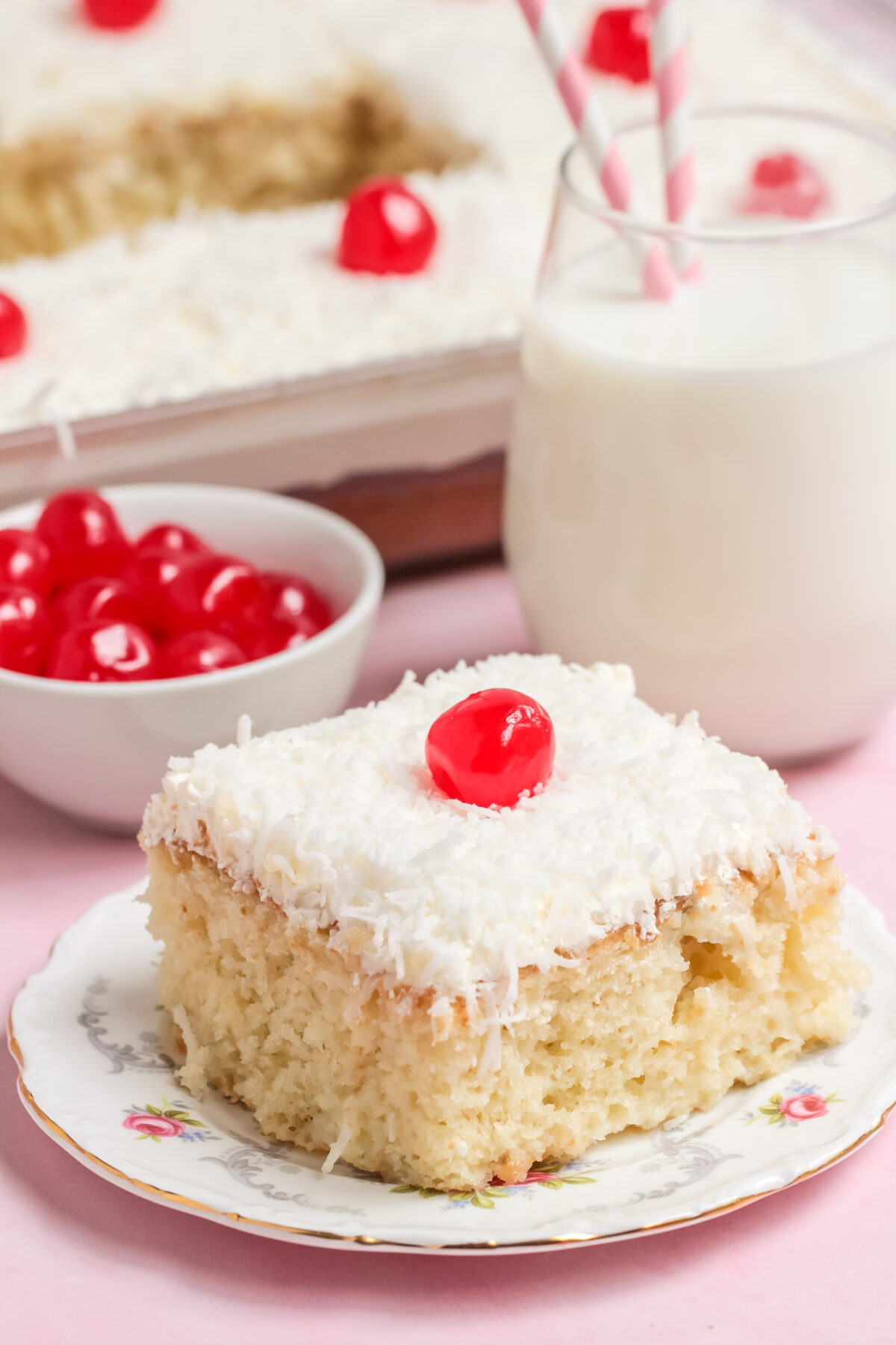 A delicious coconut poke cake recipe that is perfect for any occasion! This easy poke cake is made with coconut milk and shredded coconut.