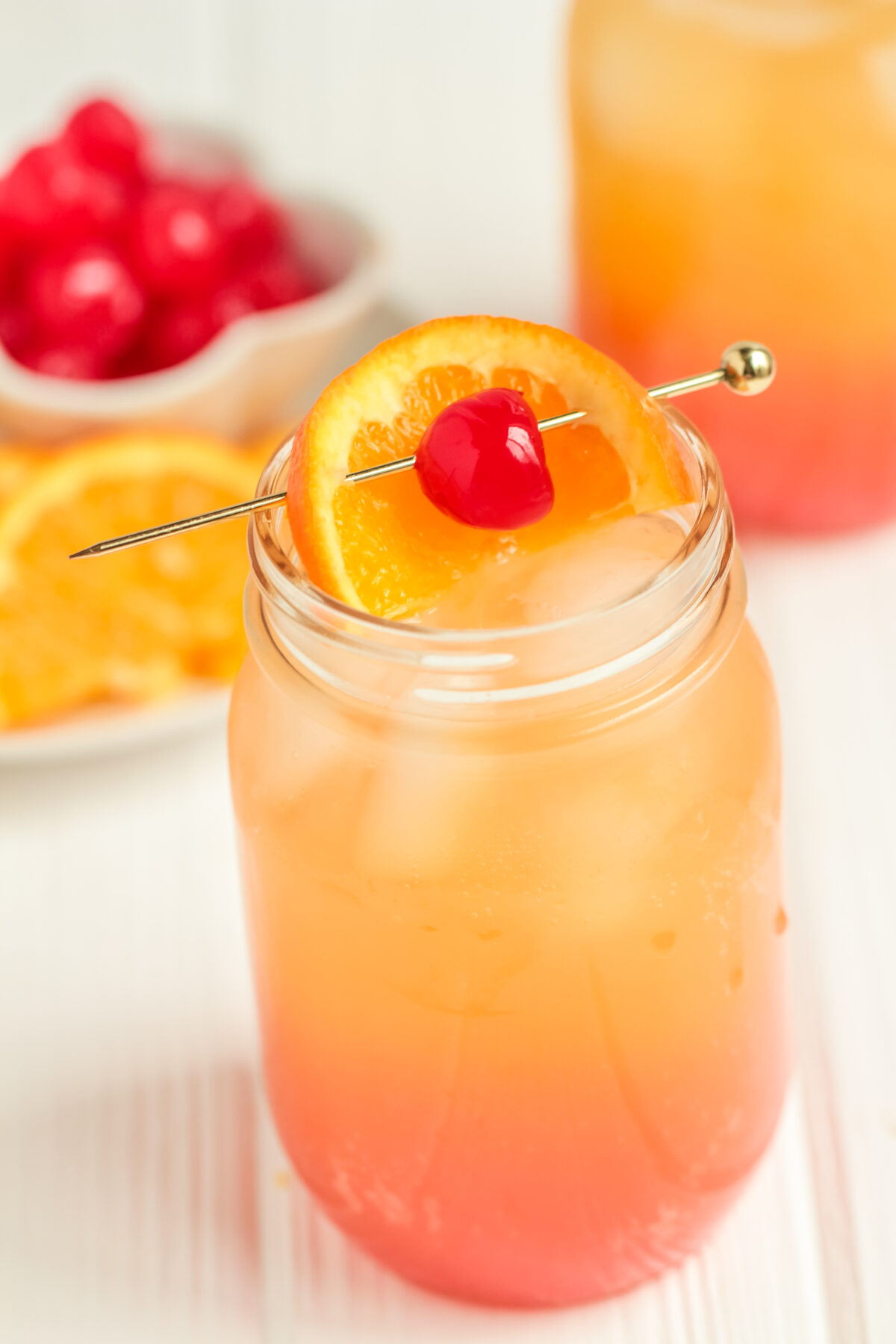 A classic Shirley Temple recipe made with lemon-lime soda, orange juice, and grenadine. Perfect fun and fancy mocktail for any party!