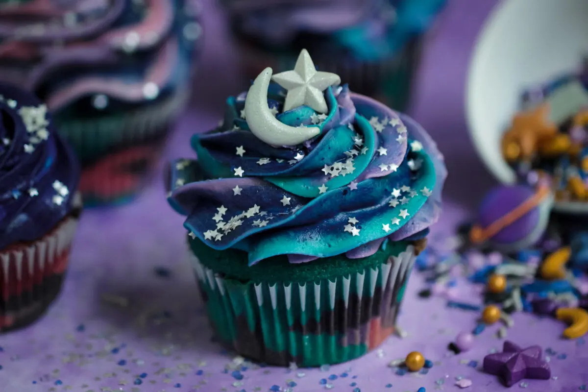 This recipe makes the most gorgeous galaxy cupcakes with a surprise inside! They're perfect for any outer space themed party.