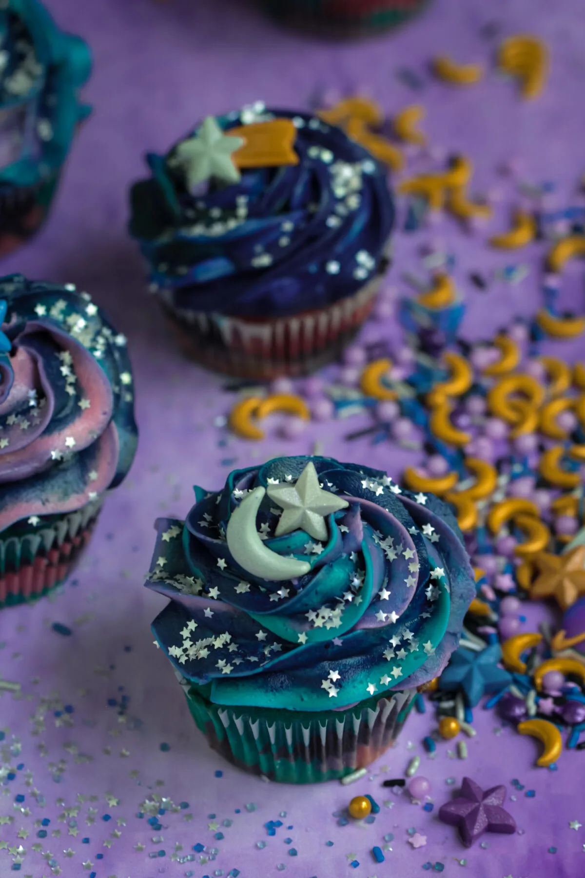 This recipe makes the most gorgeous galaxy cupcakes with a surprise inside! They're perfect for any outer space themed party.
