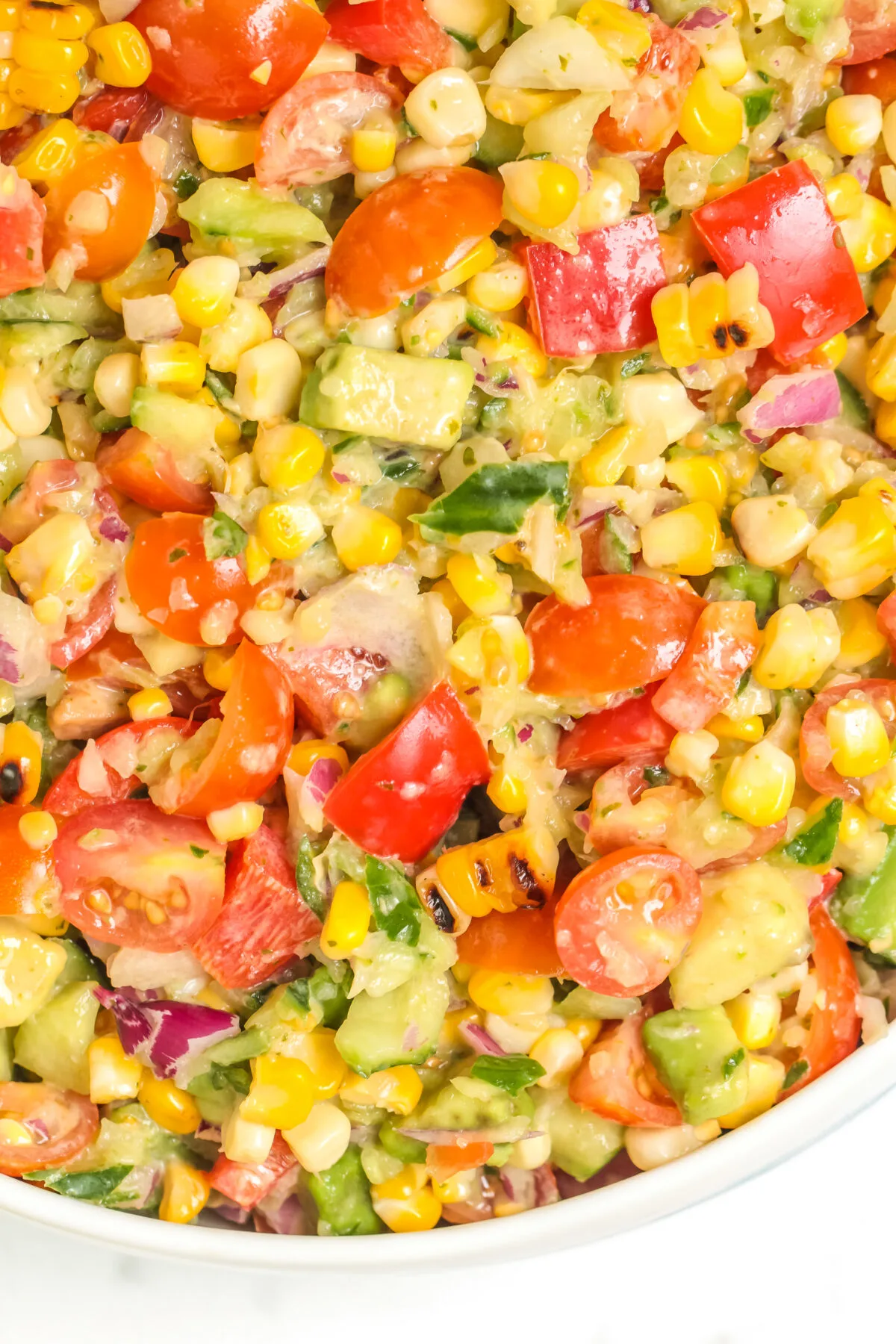 Looking for a new and delicious salad recipe? Look no further than this grilled corn salad! It's perfect for summer BBQs or potlucks.