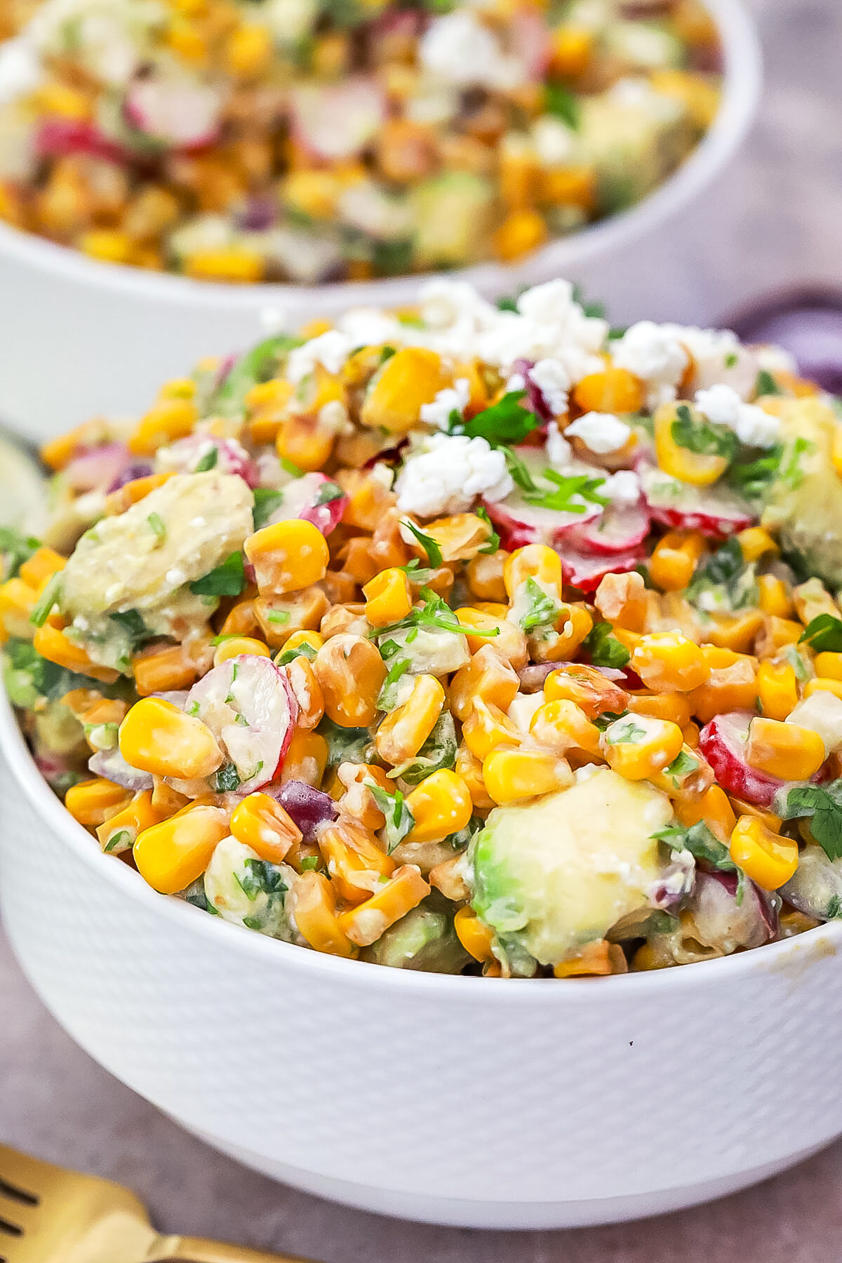 This delicious and easy Mexican Street Corn Salad recipe is perfect for summer potlucks and barbecues! It's easy to make and full of flavour.