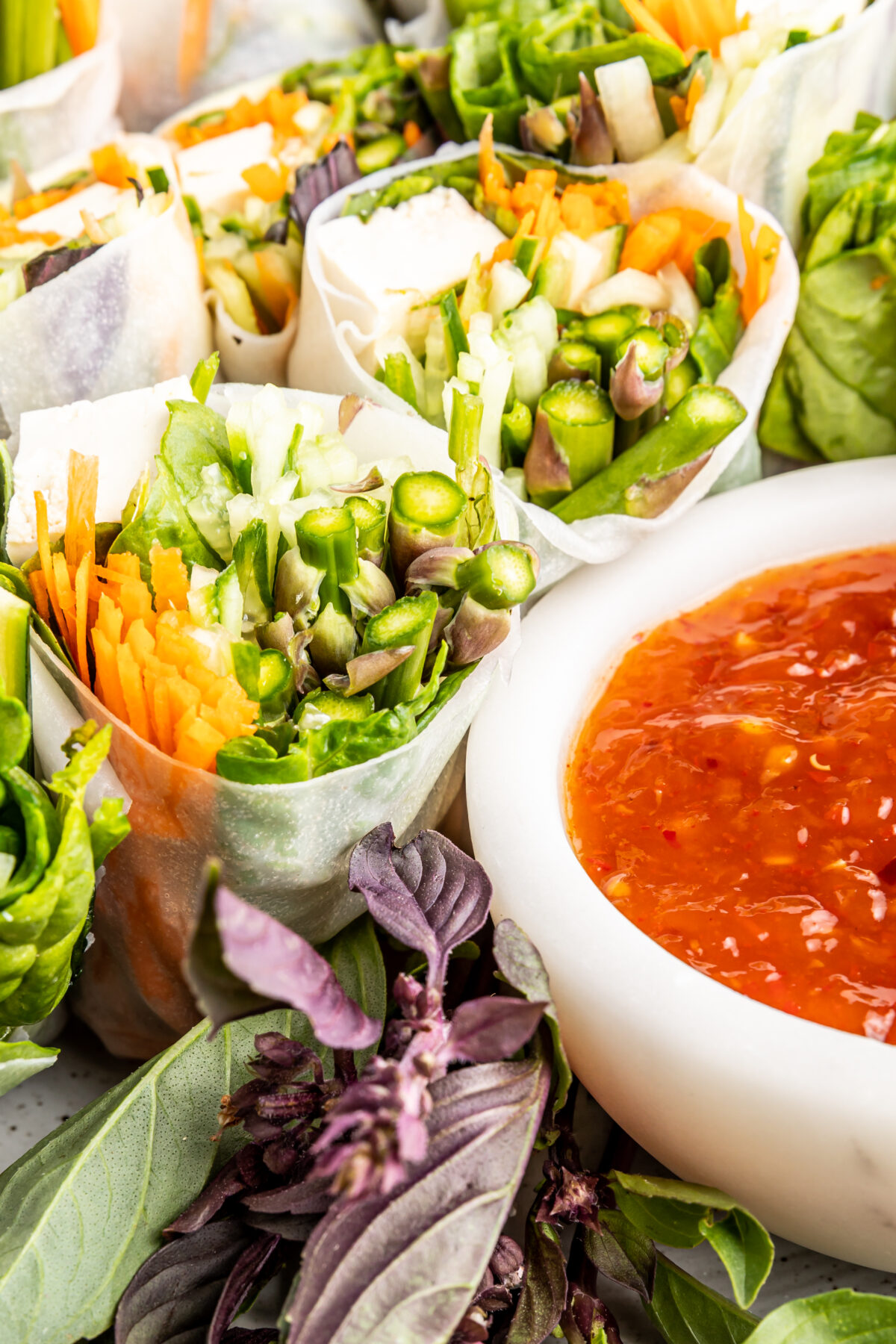 Light and refreshing, these healthy and delicious Thai Basil Zucchini Summer Rolls make the perfect appetizer, snack, or light meal.