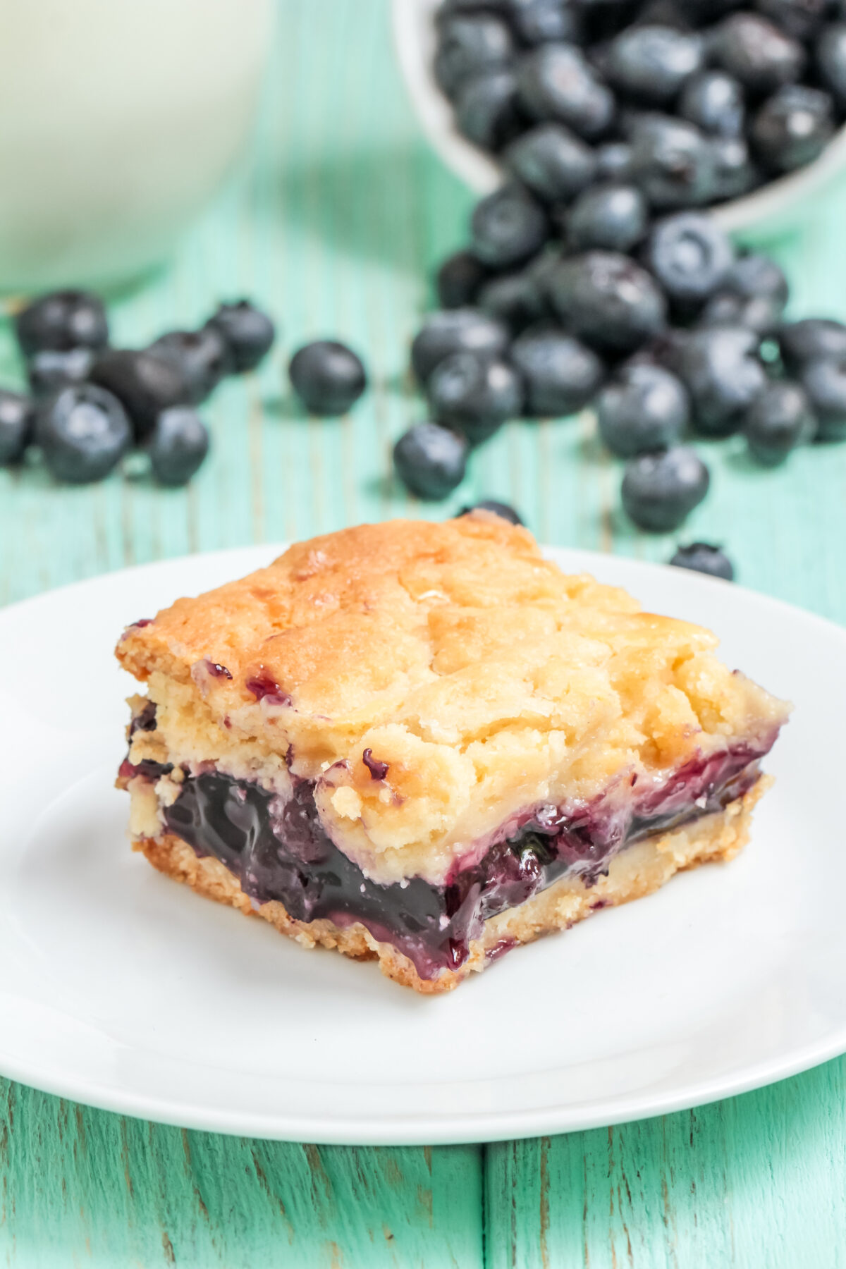 Made with cake mix and pie filling, this blueberry cream cheese bars recipe is a delicious and easy dessert that is perfect for any occasion!