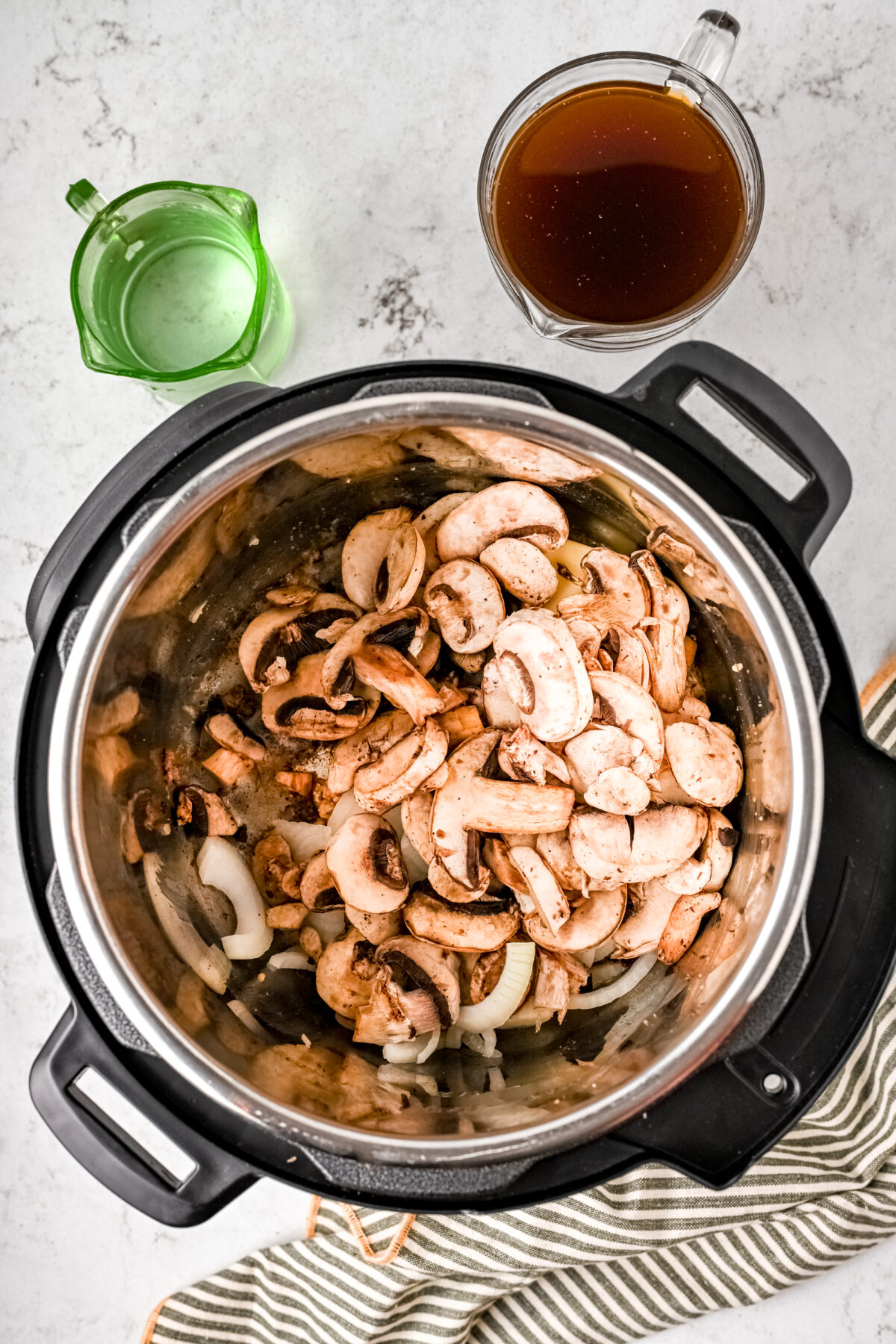 Mushrooms and onions in the instant pot.