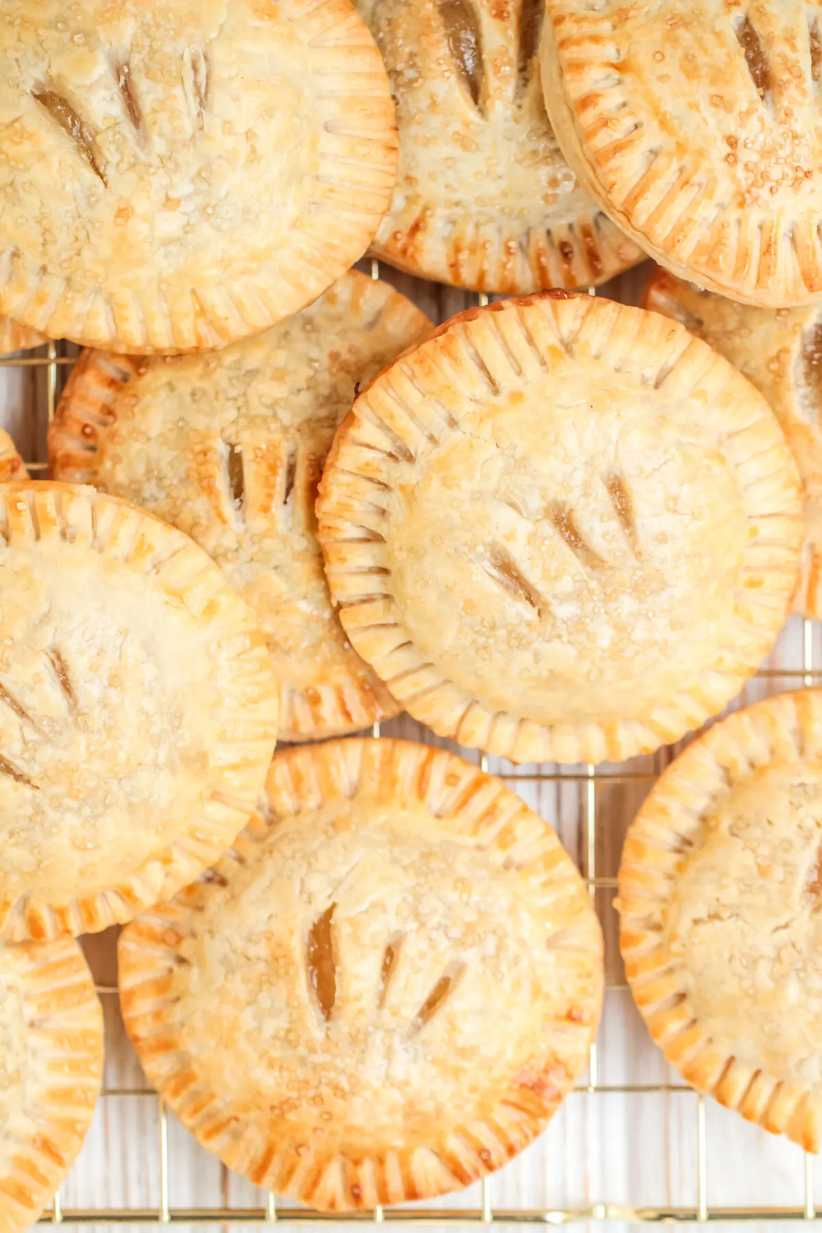 This delicious recipe for apple hand pies is perfect for autumn! These handheld pies are easy to make and perfect for a quick snack or dessert.