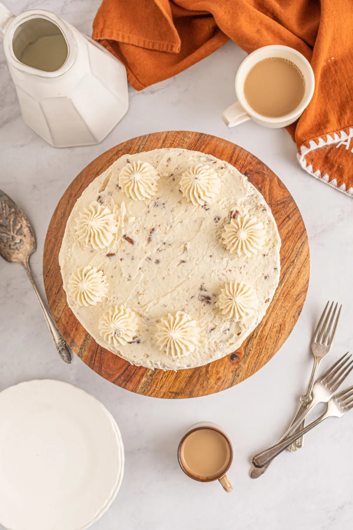 Loaded with buttery pecans, this delicious and moist butter pecan cake is layered with a rich cream cheese frosting. This cake is the best!