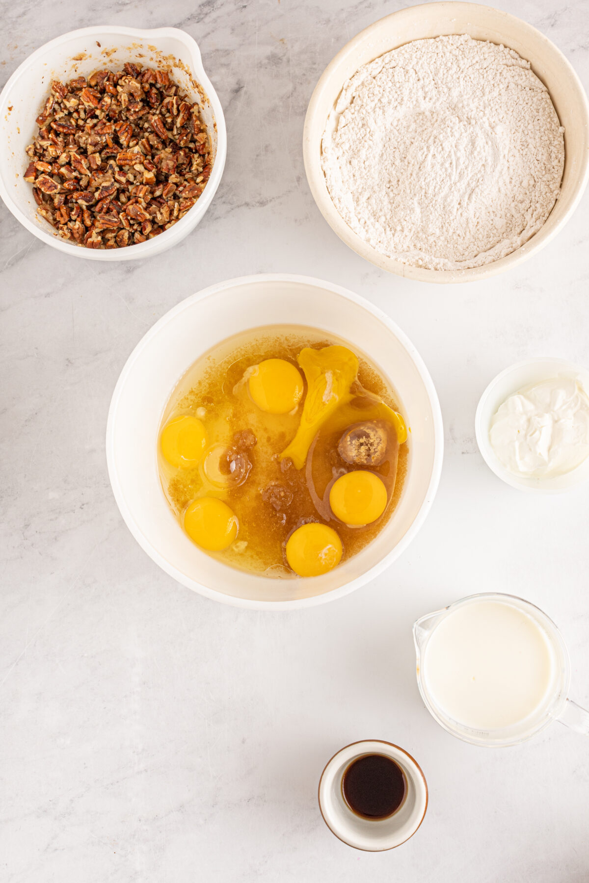 Bowl with sugar, vegetable oil, the remaining ½ cup of brown sugar and eggs. 