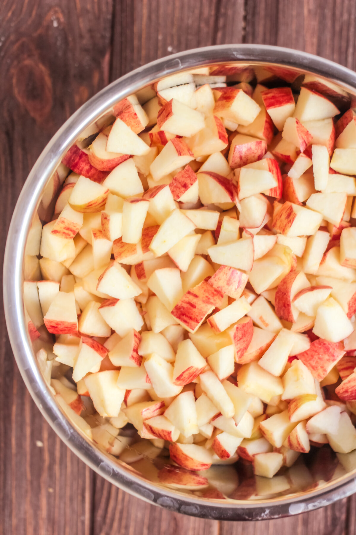 Chopped apples in the pot of an instant pot.