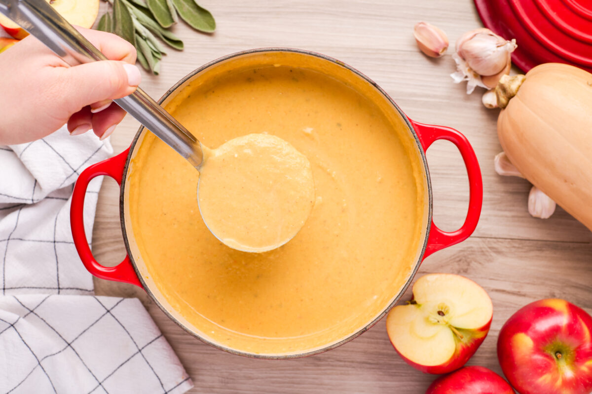 A delicious, healthy soup perfect for chilly fall days. This easy apple butternut squash soup recipe is perfect for Thanksgiving dinner!