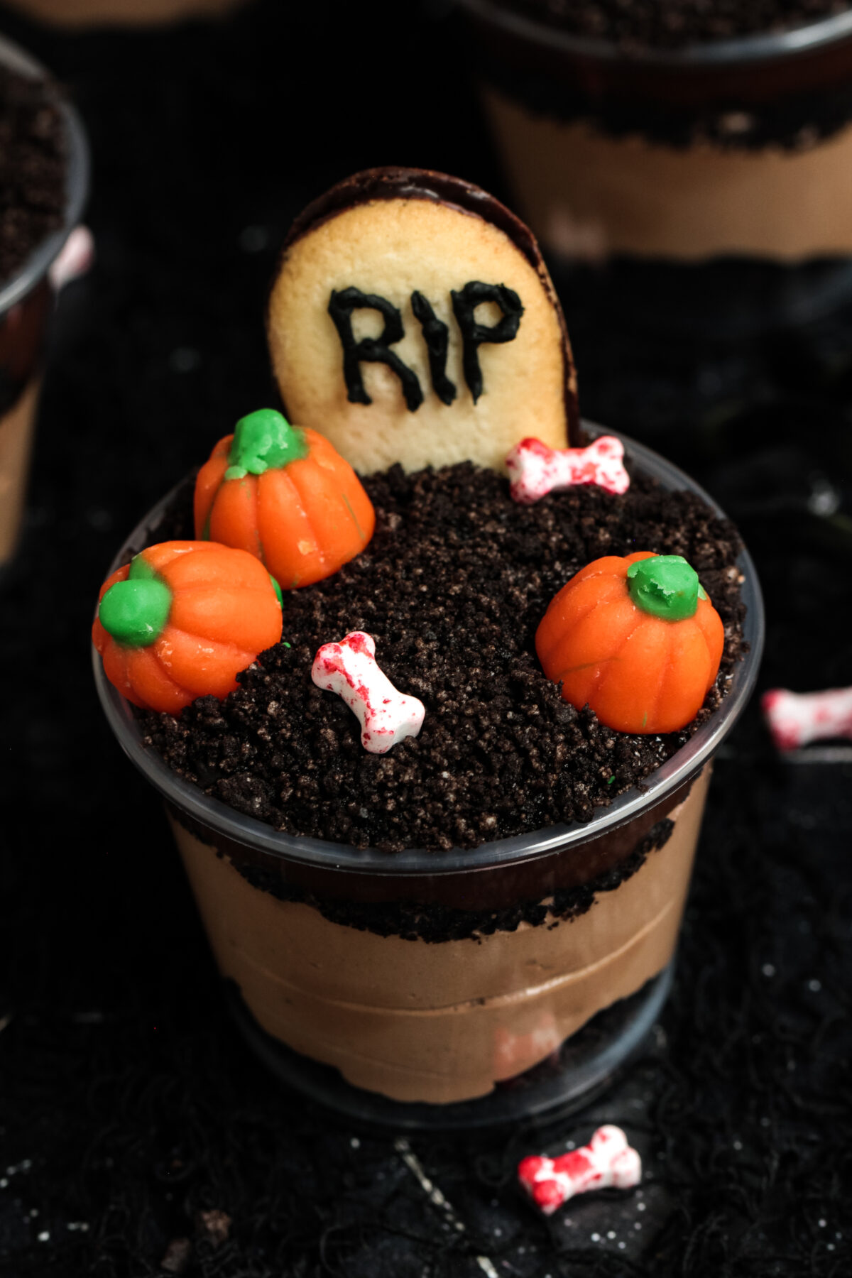 This Halloween Dirt Cups recipe is a fun and spooky treat for kids of all ages, especially for those with a bit of a sweet tooth.