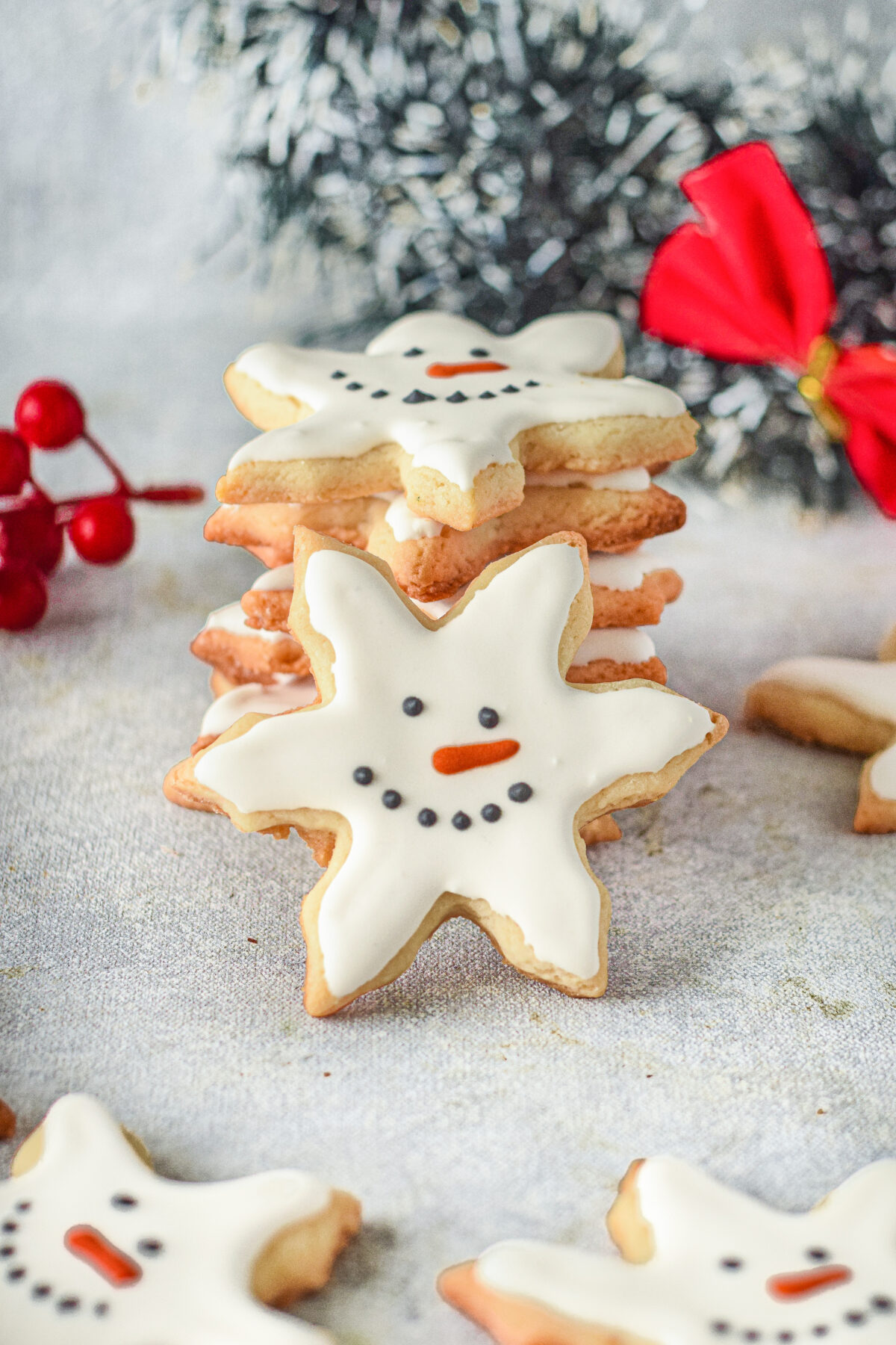 These adorable snowman snowflake cookies are perfect for the holidays! They are a festive addition for your Christmas cookie platter.