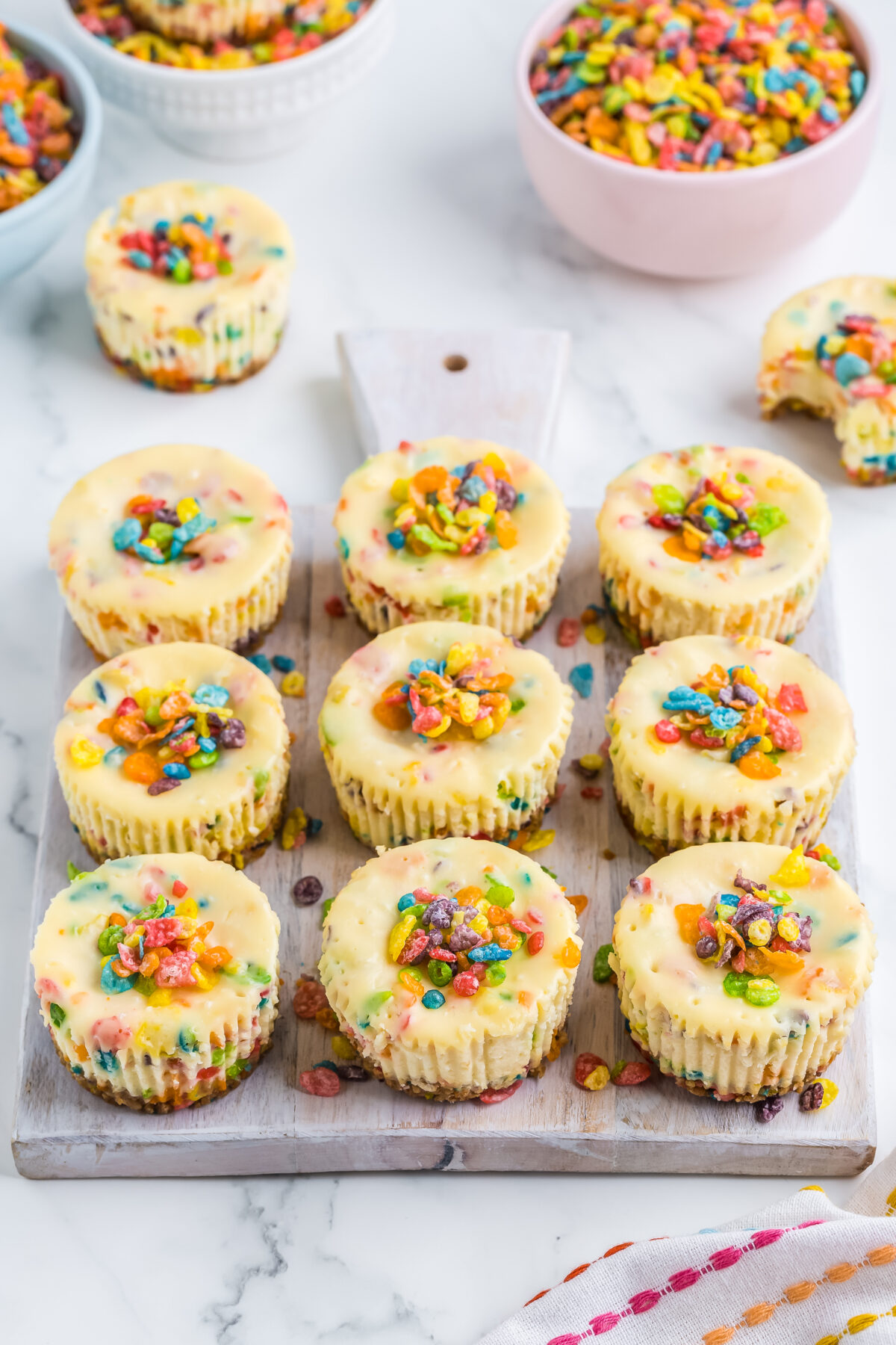 Love Fruity Pebbles cereal? Love cheesecake? Then you'll love this mini fruity pebbles cheesecake recipe! It's delicious and loads of fun!