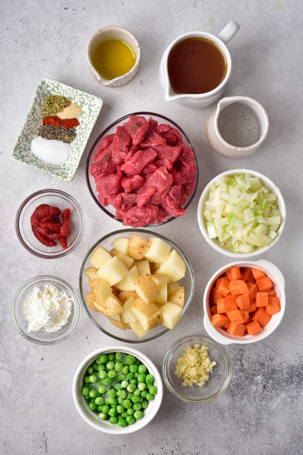 Ingredients for Beef Stew prepared and placed in small bowls.