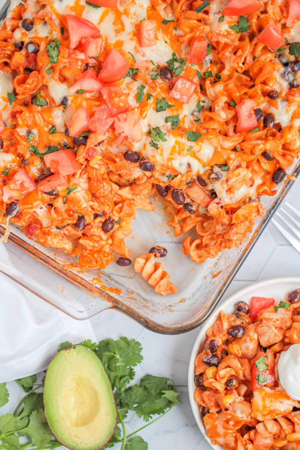 Fiesta Chicken Casserole is a fun twist on the traditional chicken and noodle casserole. It's easy to make, and full of Tex-Mex flavours!
