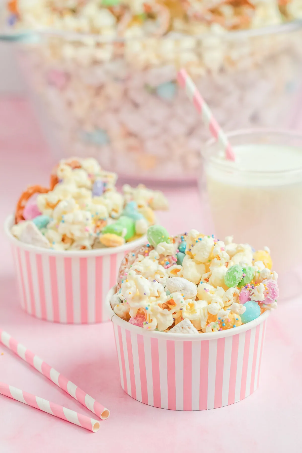This bunny bait recipe is a tasty Easter snack mix made with popcorn, pastel M&M's, pretzels, white chocolate, sprinkles, and muddy buddies.