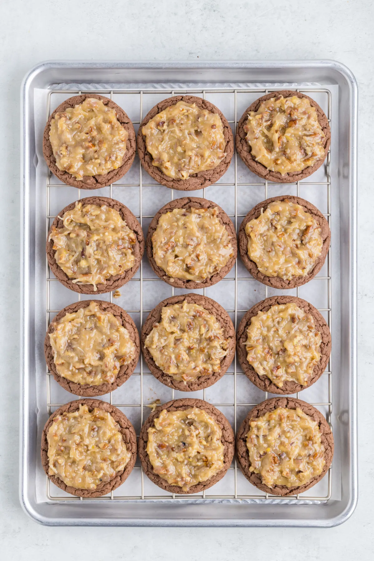 Chocolate cookies topped with coconut-pecan frosting.