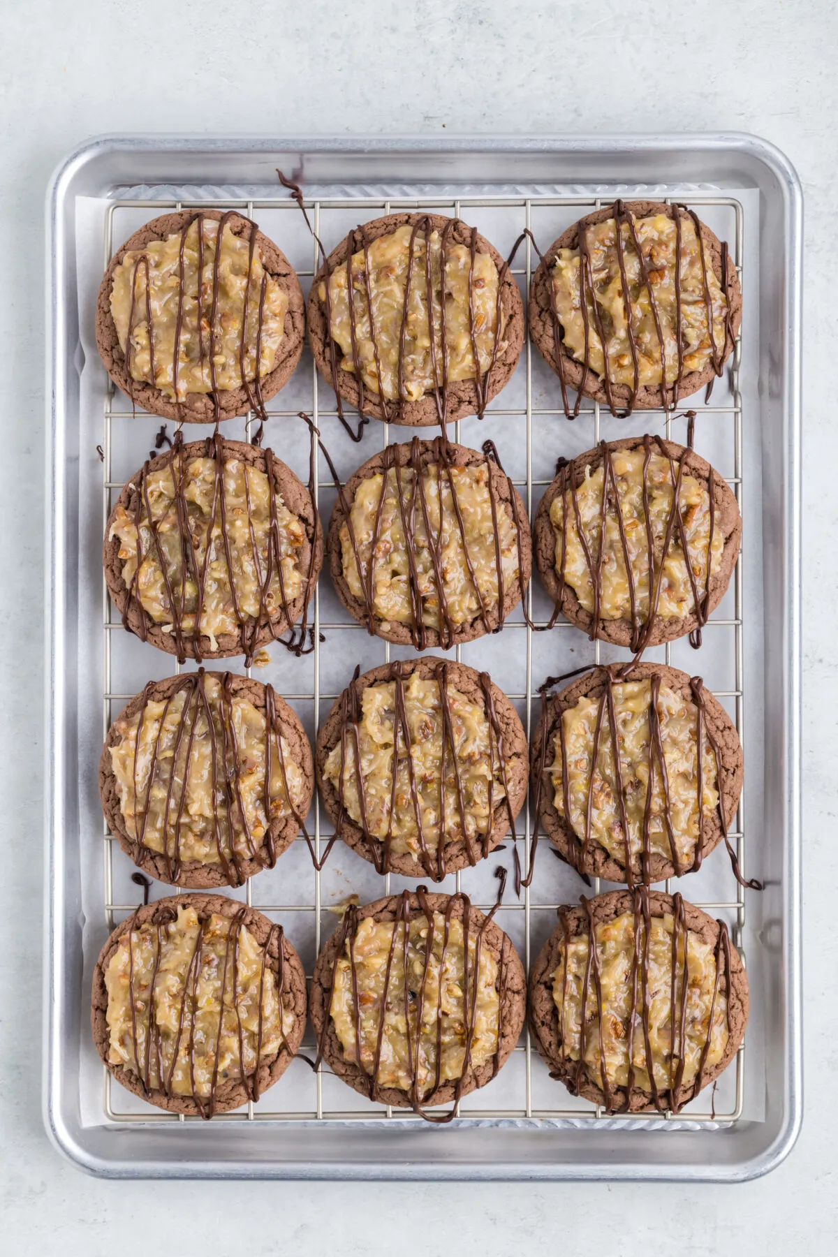 Chocolate drizzled over the cookies.