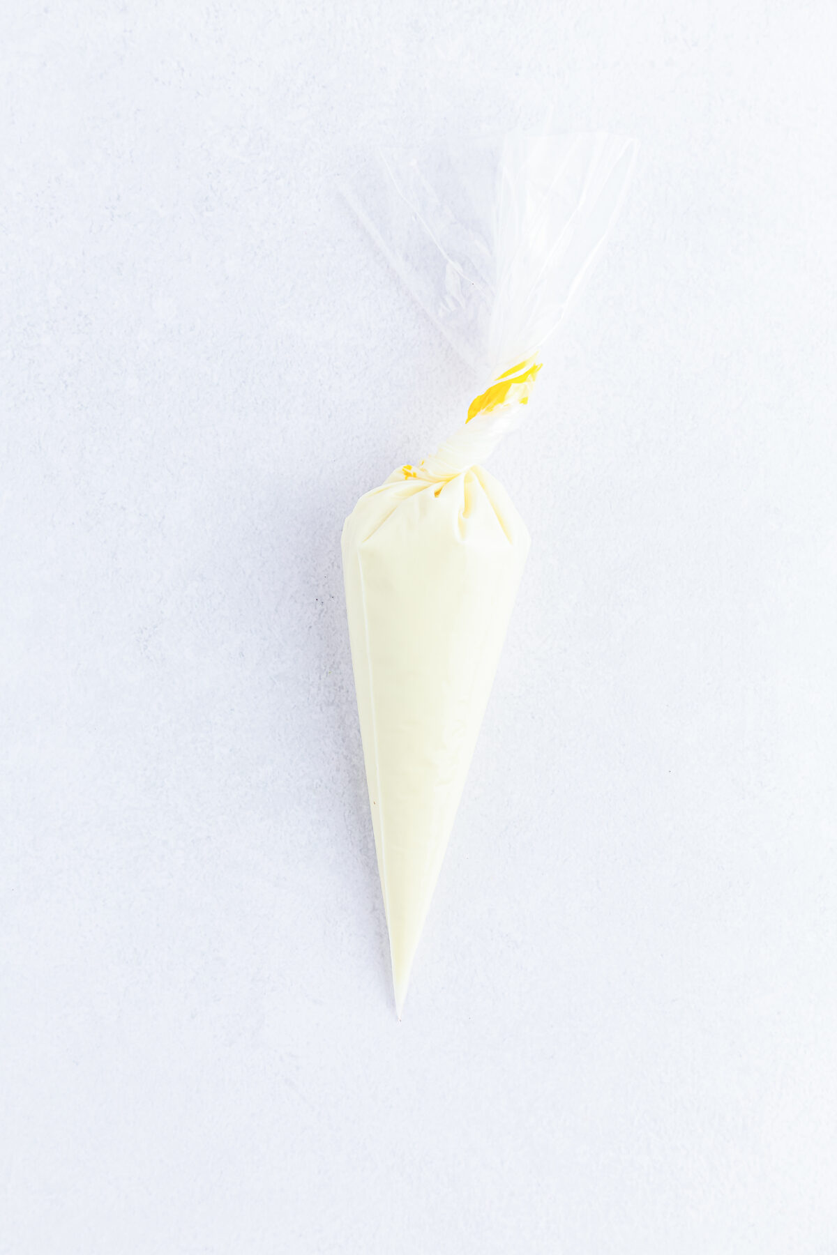 White chocolate in a piping bag.