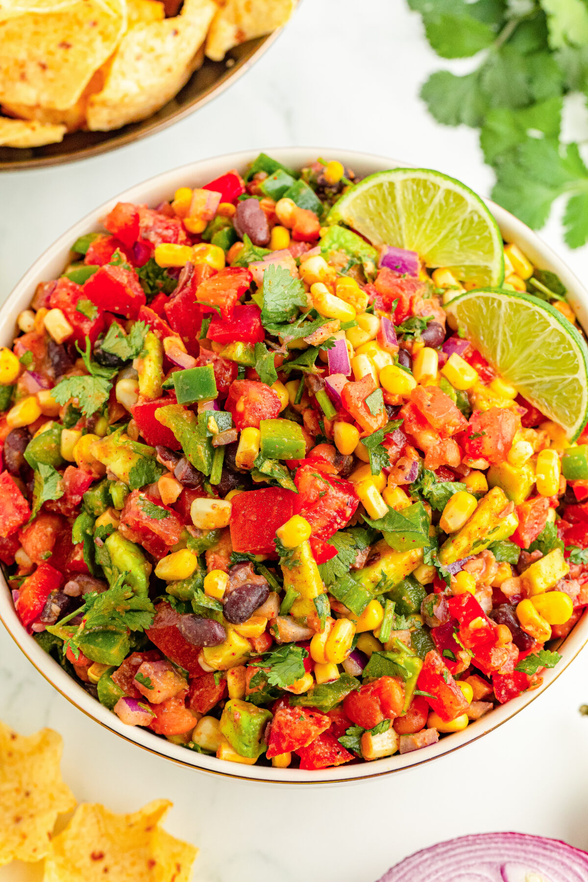 Discover a hearty cowboy caviar recipe, loaded with beans and fresh produce tossed in zesty lime dressing for a delicious, flavoursome dish.