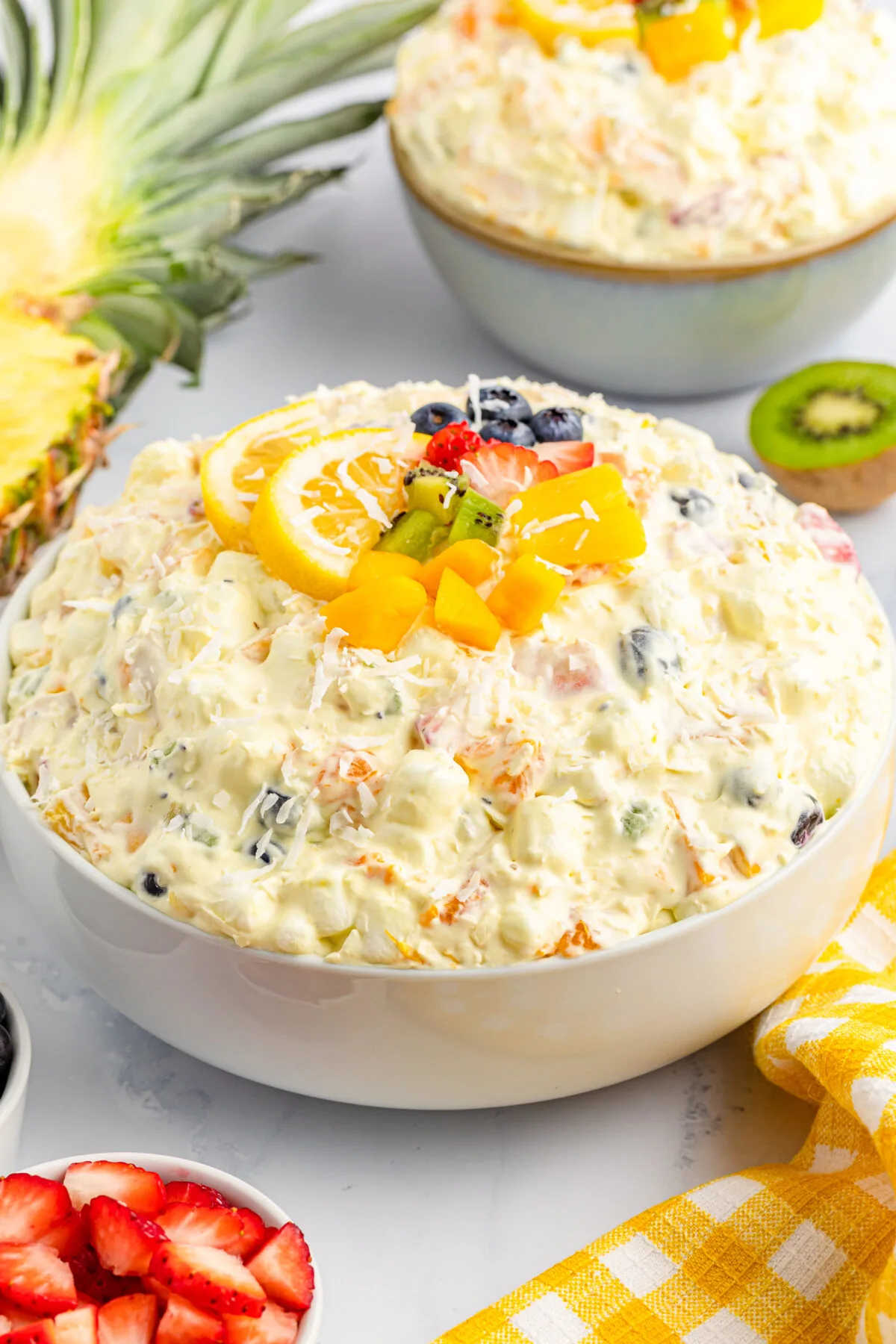 Packed full of island flavours, our easy tropical fruit fluff salad recipe is a perfect dessert or side dish for any occasion!
