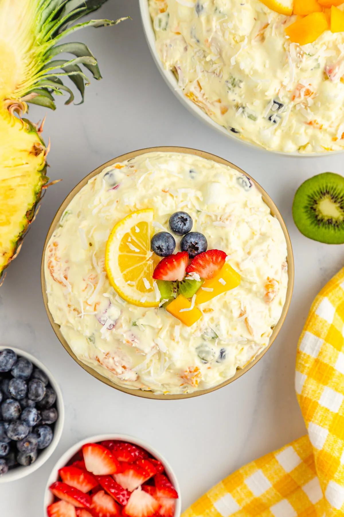 Packed full of island flavours, our easy tropical fruit fluff salad recipe is a perfect dessert or side dish for any occasion!