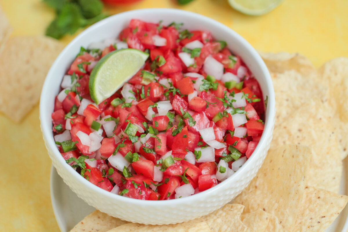 Making amazing pico de gallo at home is easier than you think. This classic Mexican condiment that is sure to win over any crowd!