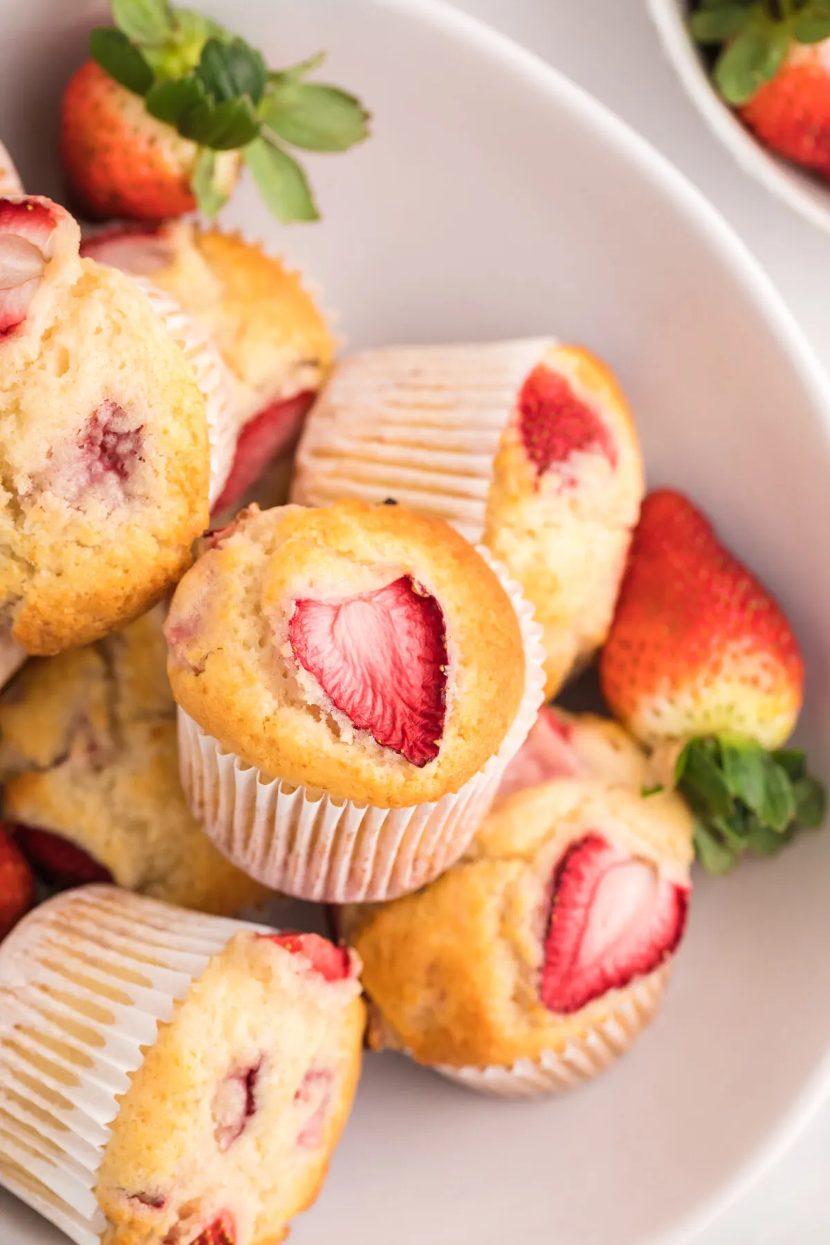 Whip up a batch of moist and fluffy strawberry muffins in no time with this simple recipe! Perfect for breakfast, brunch, or a sweet snack!