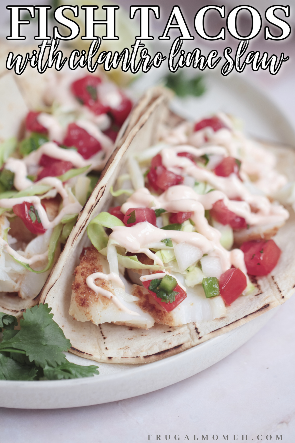 Make your next taco night extra special with these easy fish tacos topped with zesty cilantro lime slaw and sriracha sour cream!