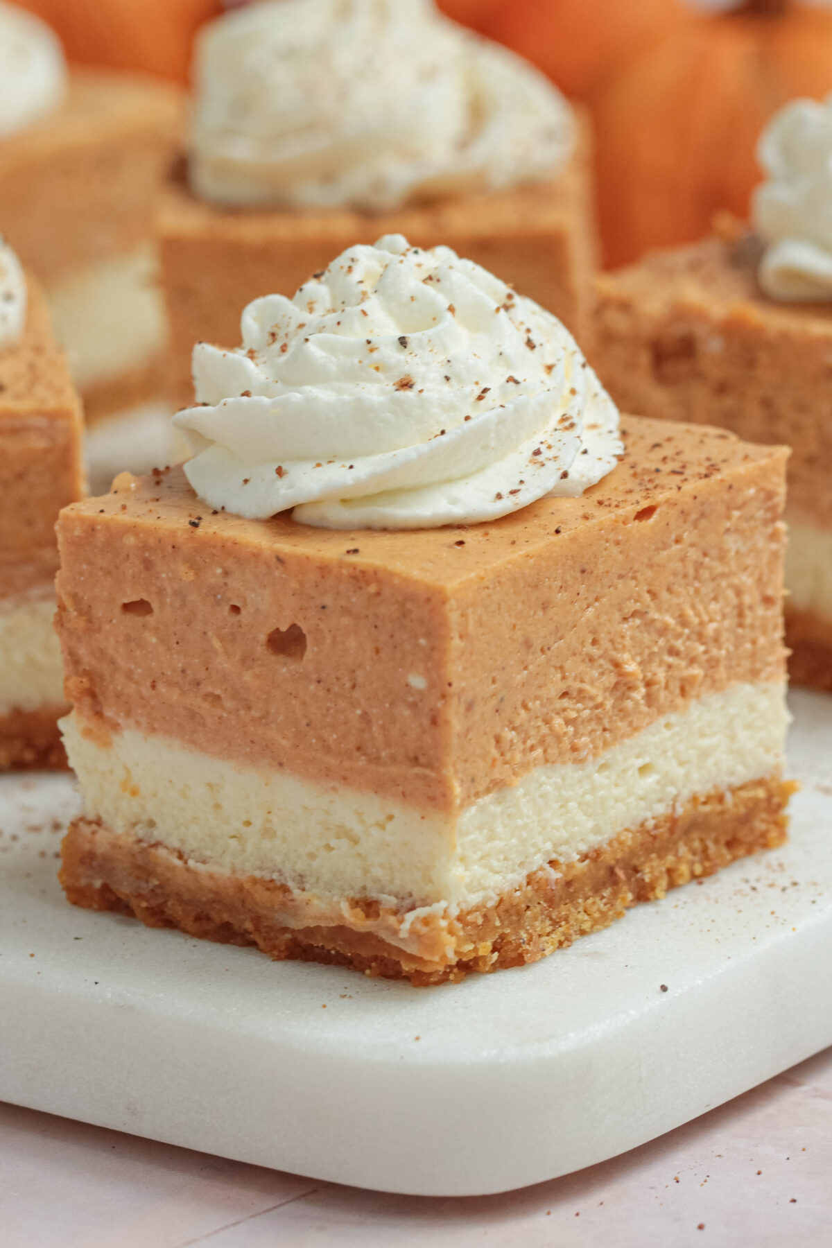 Make this delicious Fall treat with our easy recipe! Lightly spiced and perfectly creamy, these pumpkin cheesecake bars are sure to be a hit.