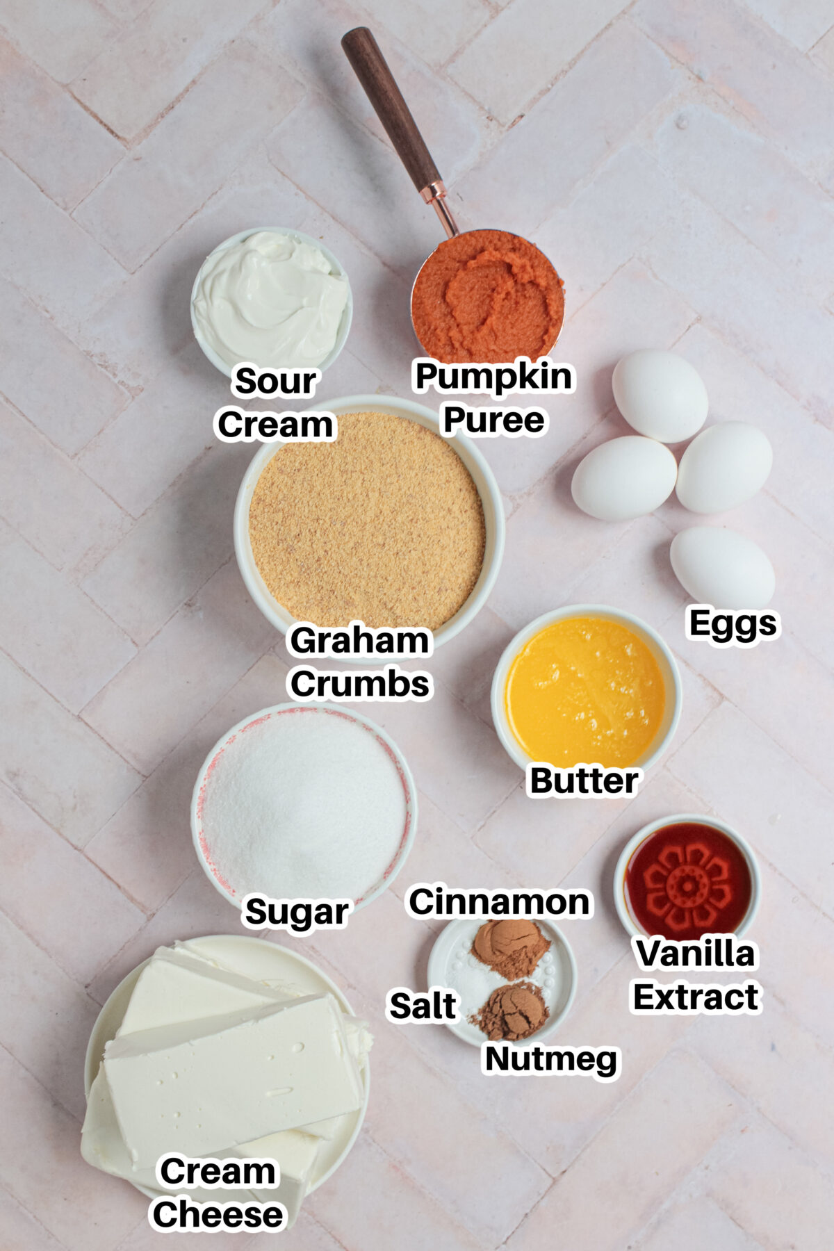 Ingredients for making pumpkin cheesecake bars.