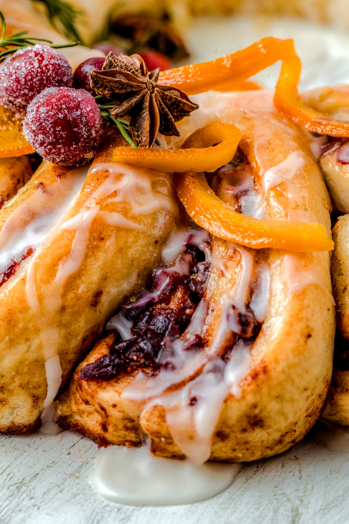Make your holiday season extra special with this delicious Cranberry Orange Cinnamon Roll Wreath. It's sure to be a hit at any holiday party!