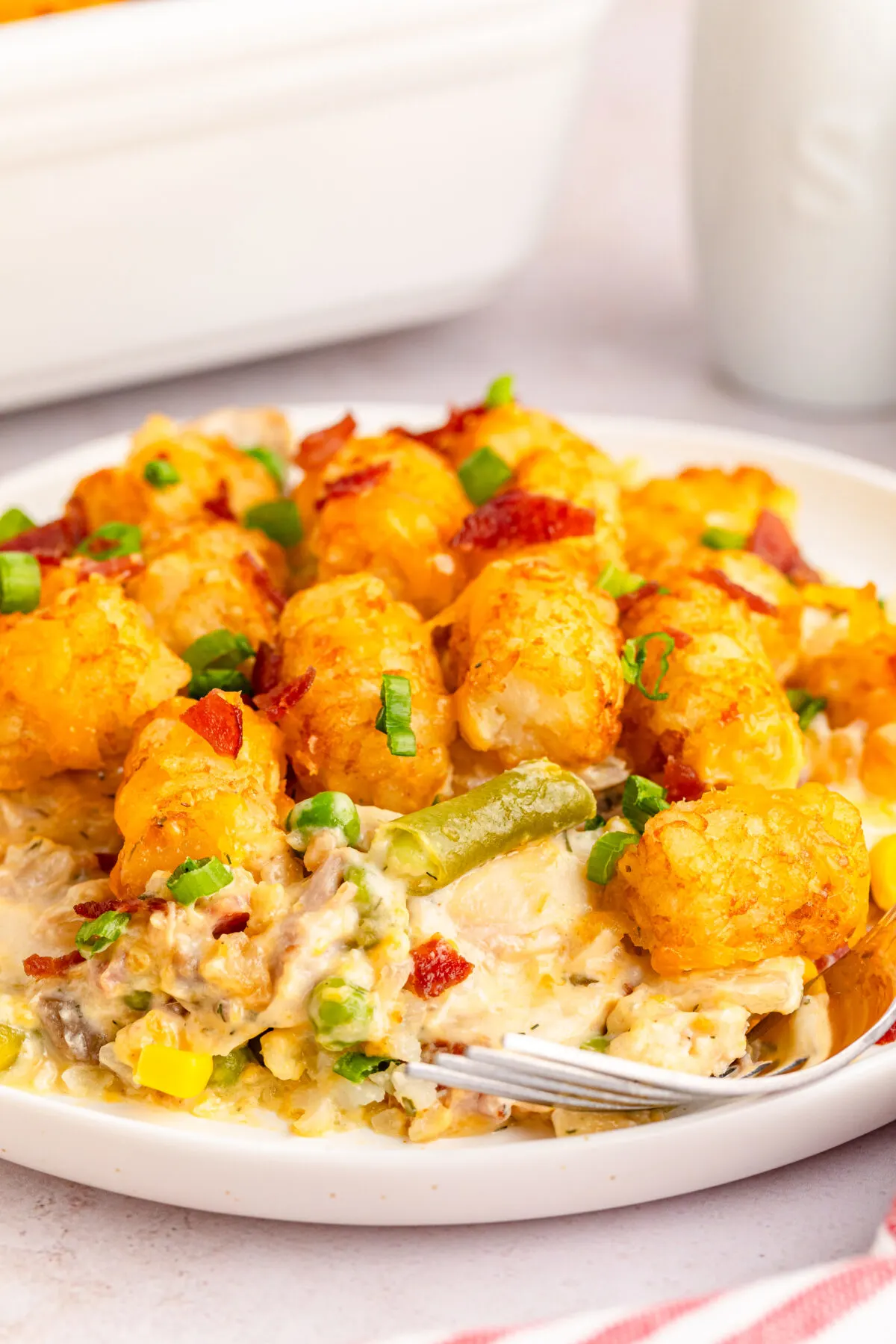 Craving comfort food? Look no further than our mouth-watering chicken tater tot casserole recipe. Perfect for any night of the week!