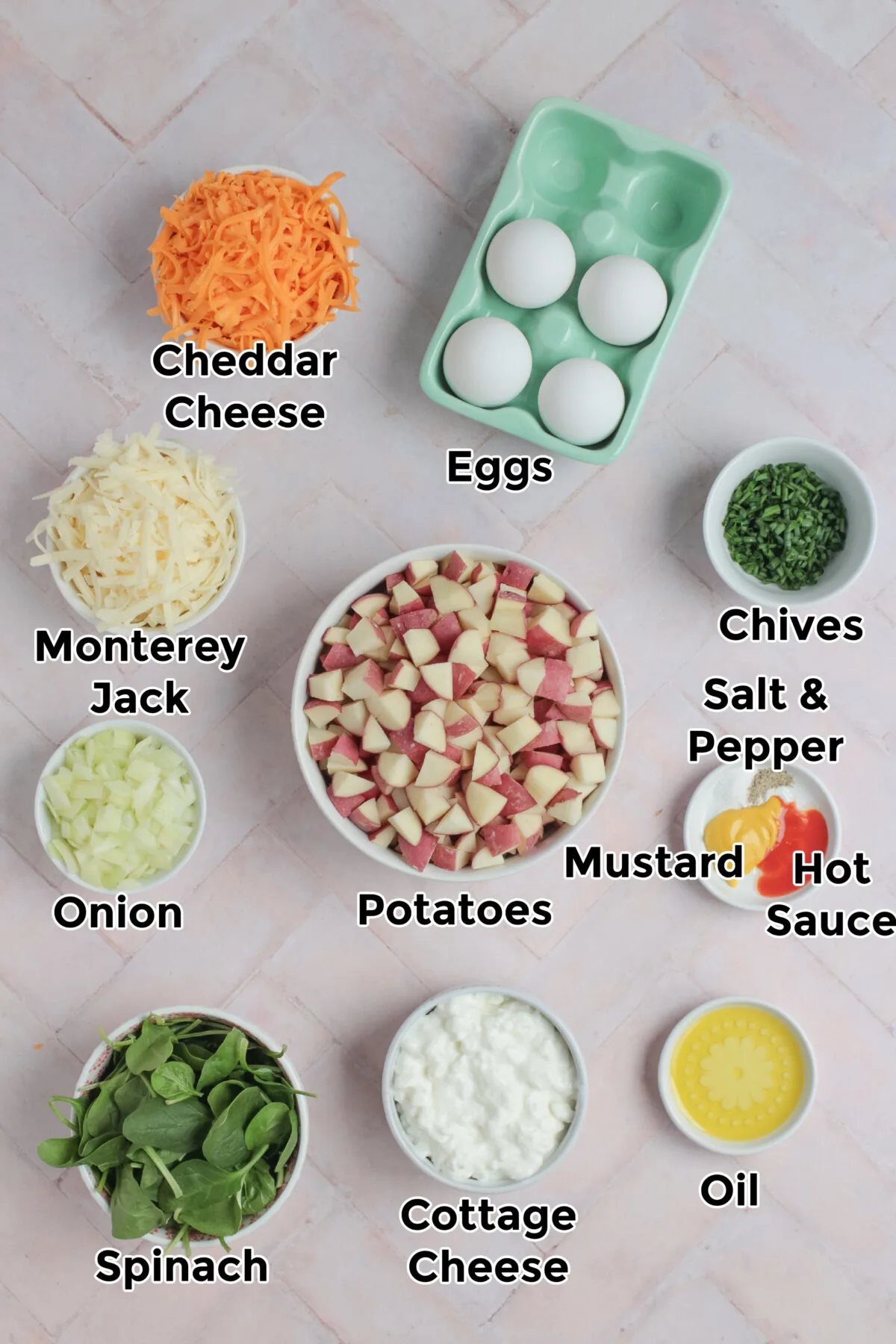 Ingredients for potato, cheddar and chive bakes.