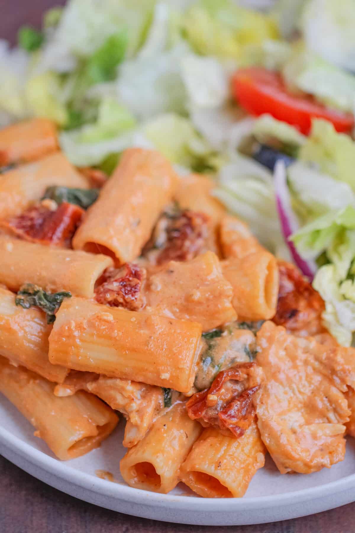 This creamy Tuscan Chicken Pasta features tender chicken, sun-dried tomatoes, spinach, and Parmesan in a rich, flavourful sauce.