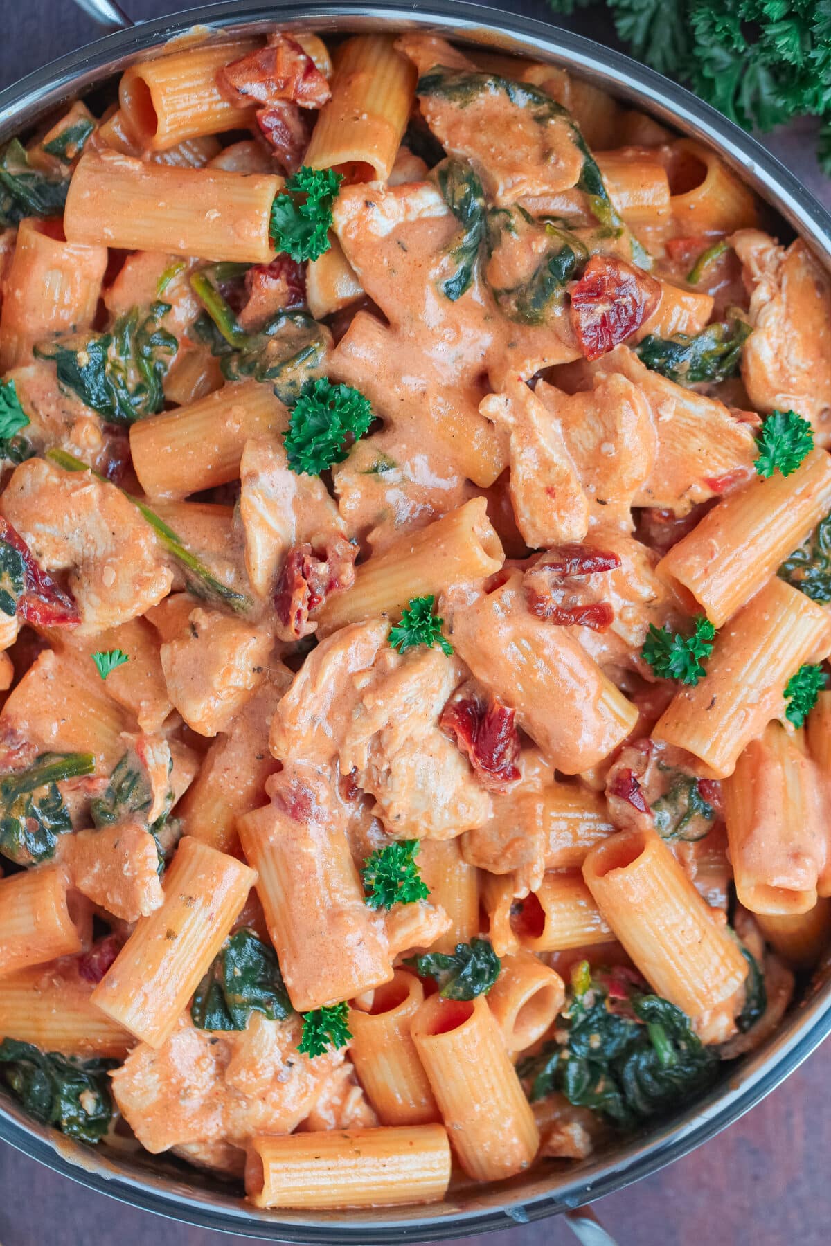 This creamy Tuscan Chicken Pasta features tender chicken, sun-dried tomatoes, spinach, and Parmesan in a rich, flavourful sauce.