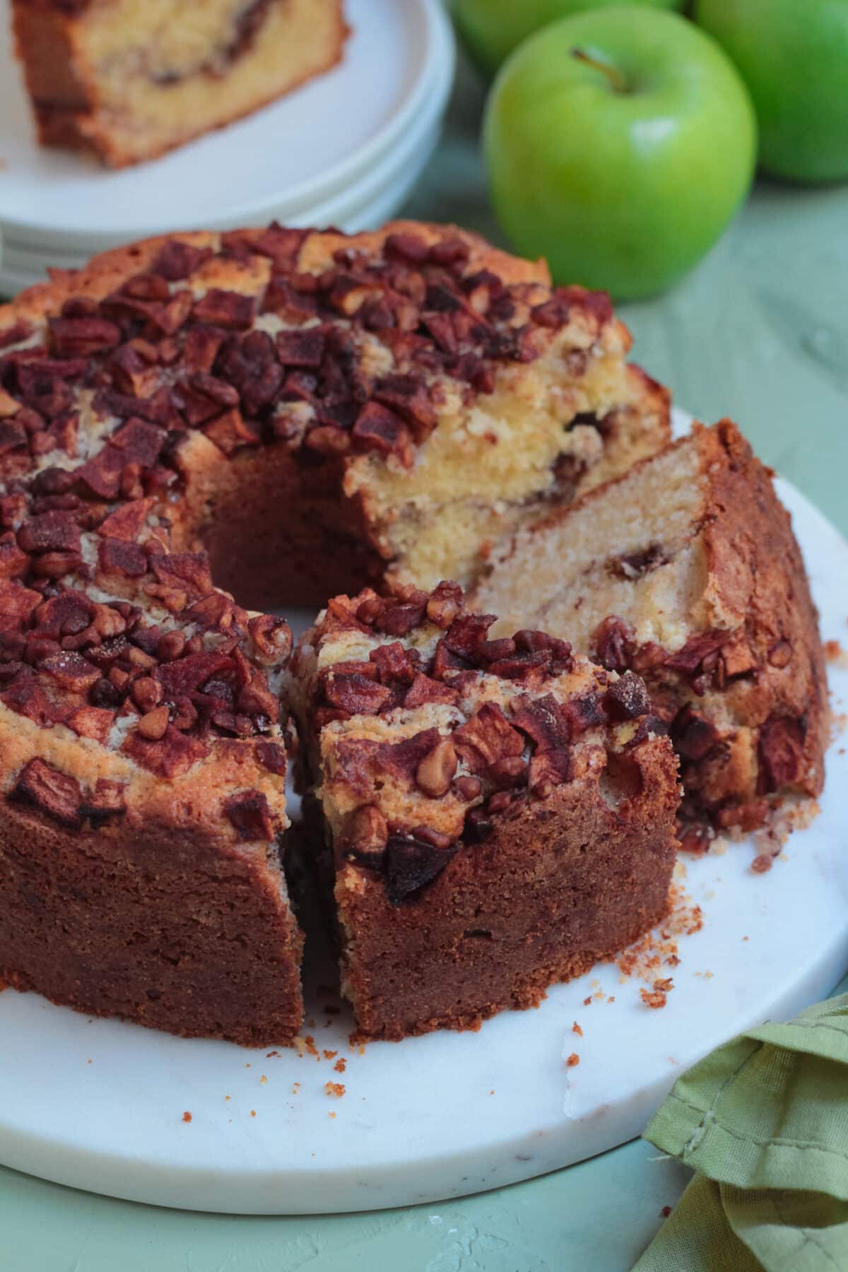 This old-fashioned apple coffee cake is a family favourite - made with a moist sour cream batter, cinnamon apples, and a crunchy topping.